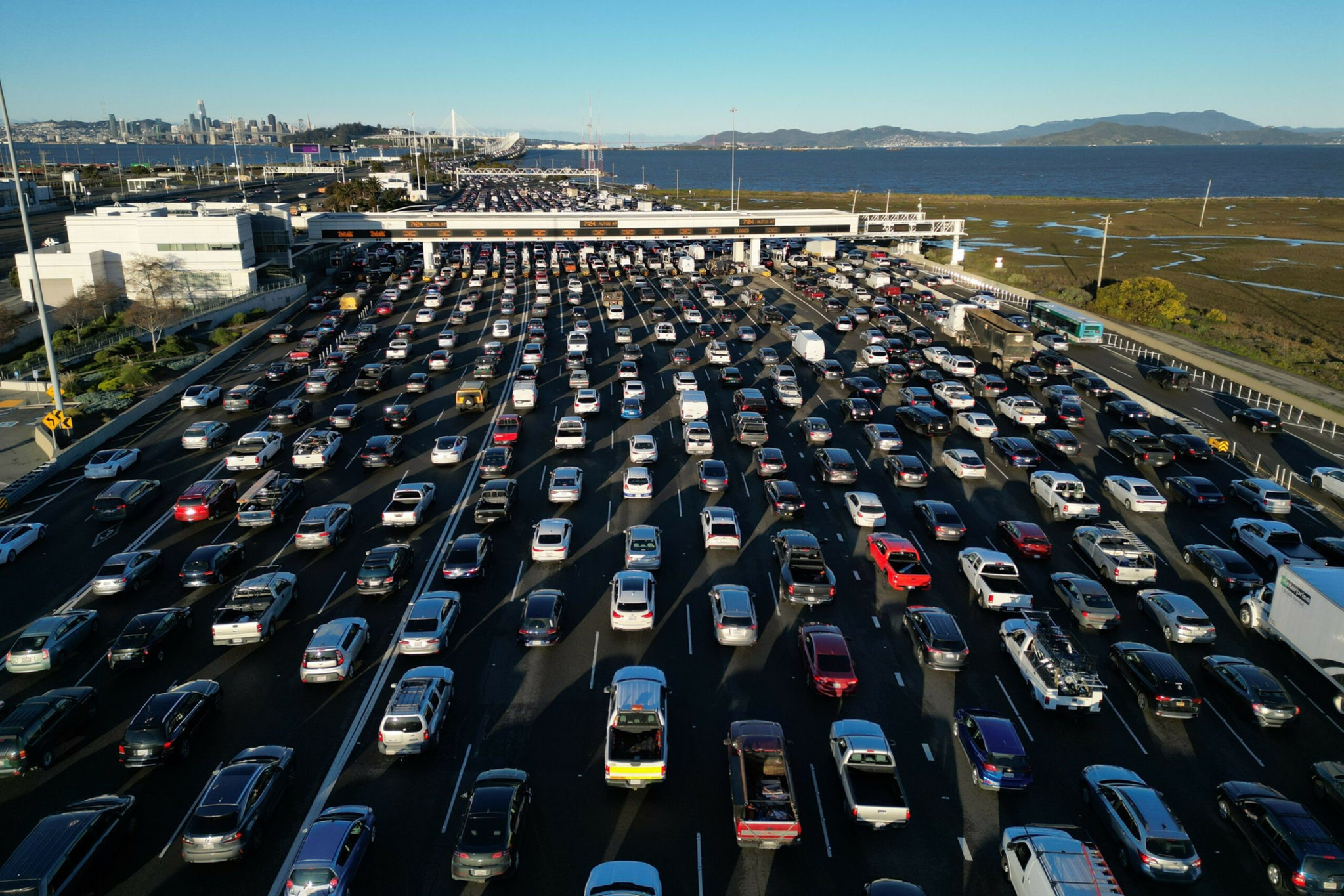 A multi lane highway backed up with traffic