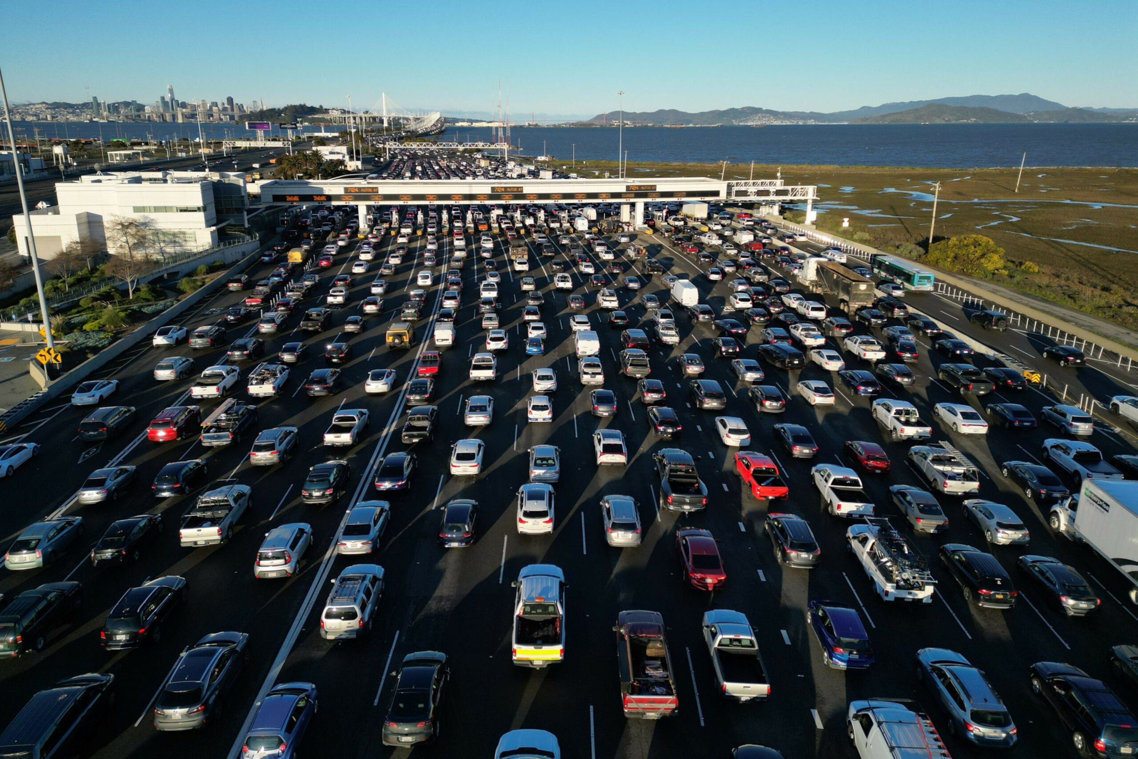 A multi lane highway backed up with traffic
