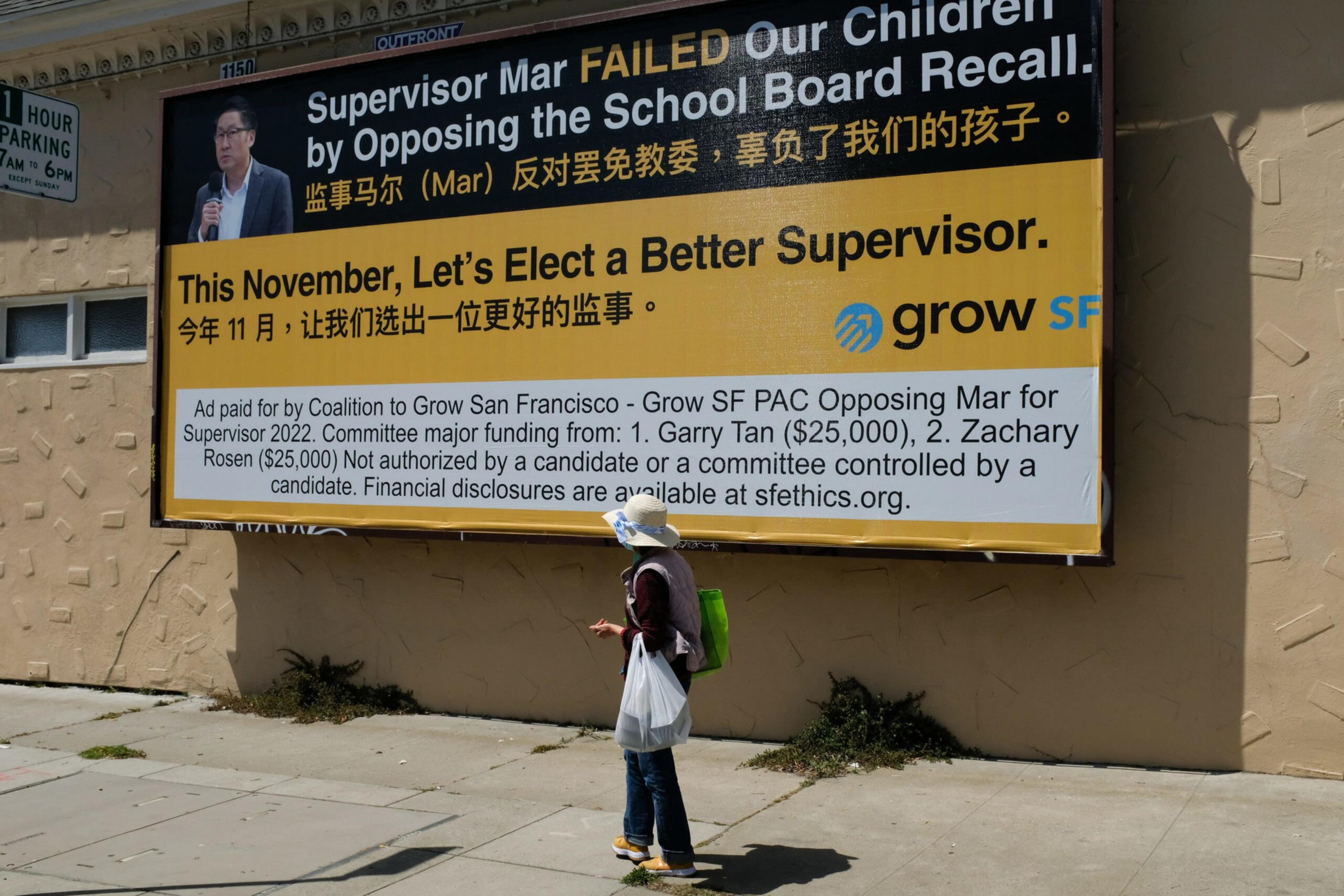 A political billboard criticizes Supervisor Mar for opposing a school board recall, urging voters to elect a better supervisor this November, with text in English and Chinese.