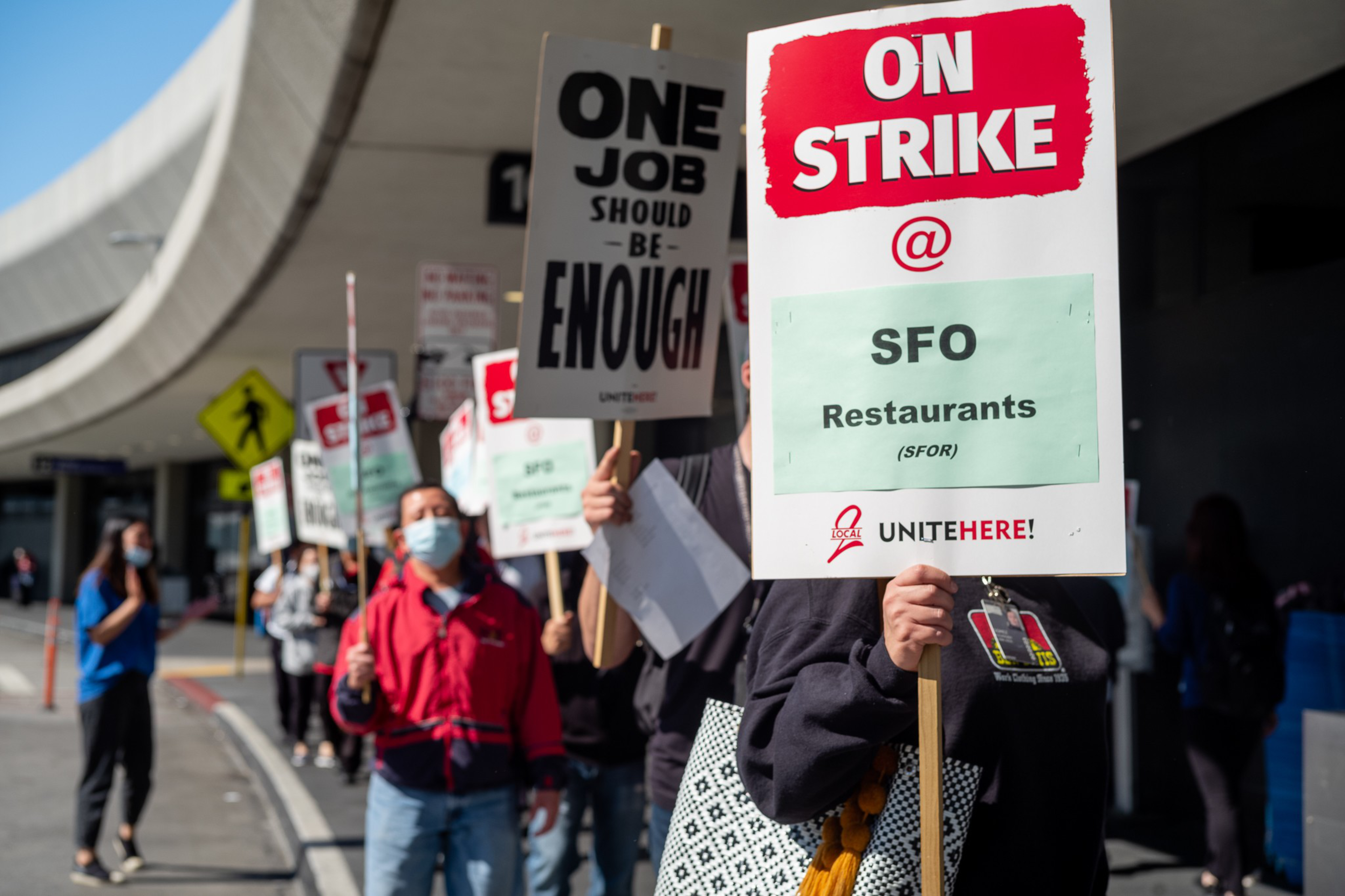 Fast food workers are on strike Monday morning at the San Francisco International Airport (SFO), according to the union representing the workers, in San Francisco, Calif., on Sept. 26, 2022. The workers, represented by the Unite Here Local 2, started strik