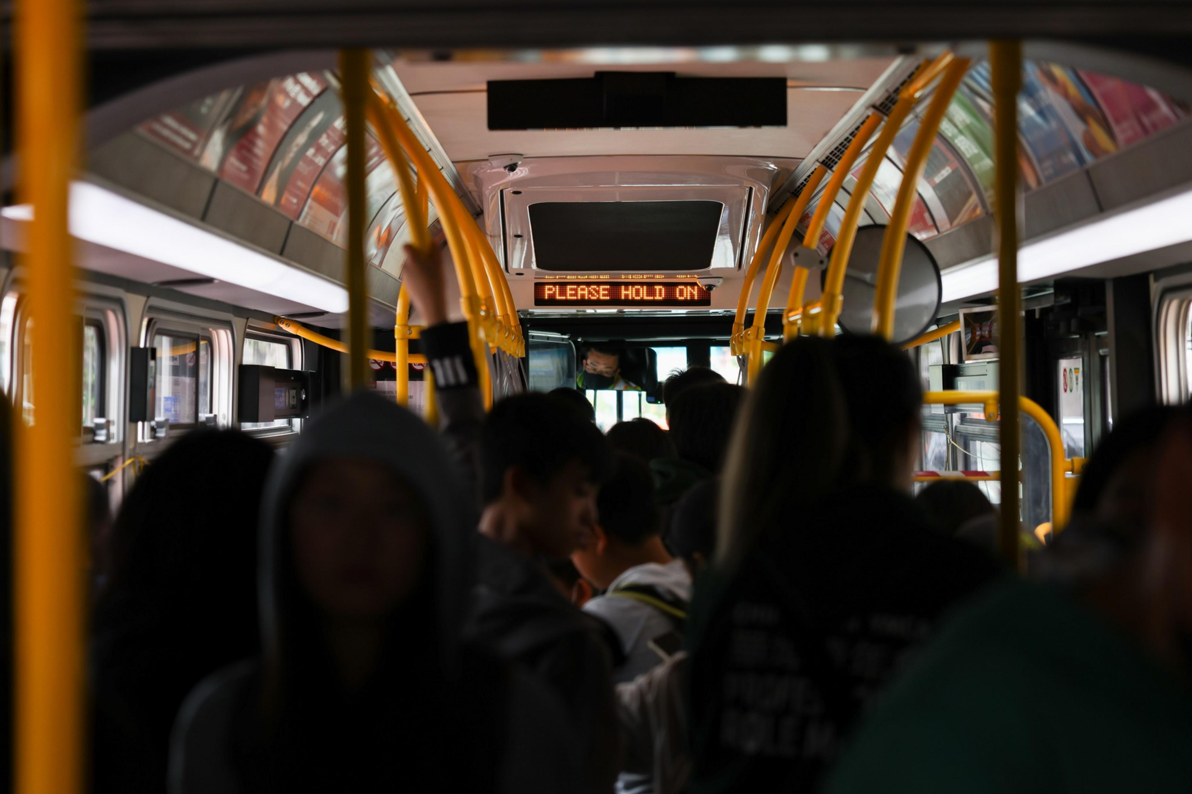 Riders on a bus.