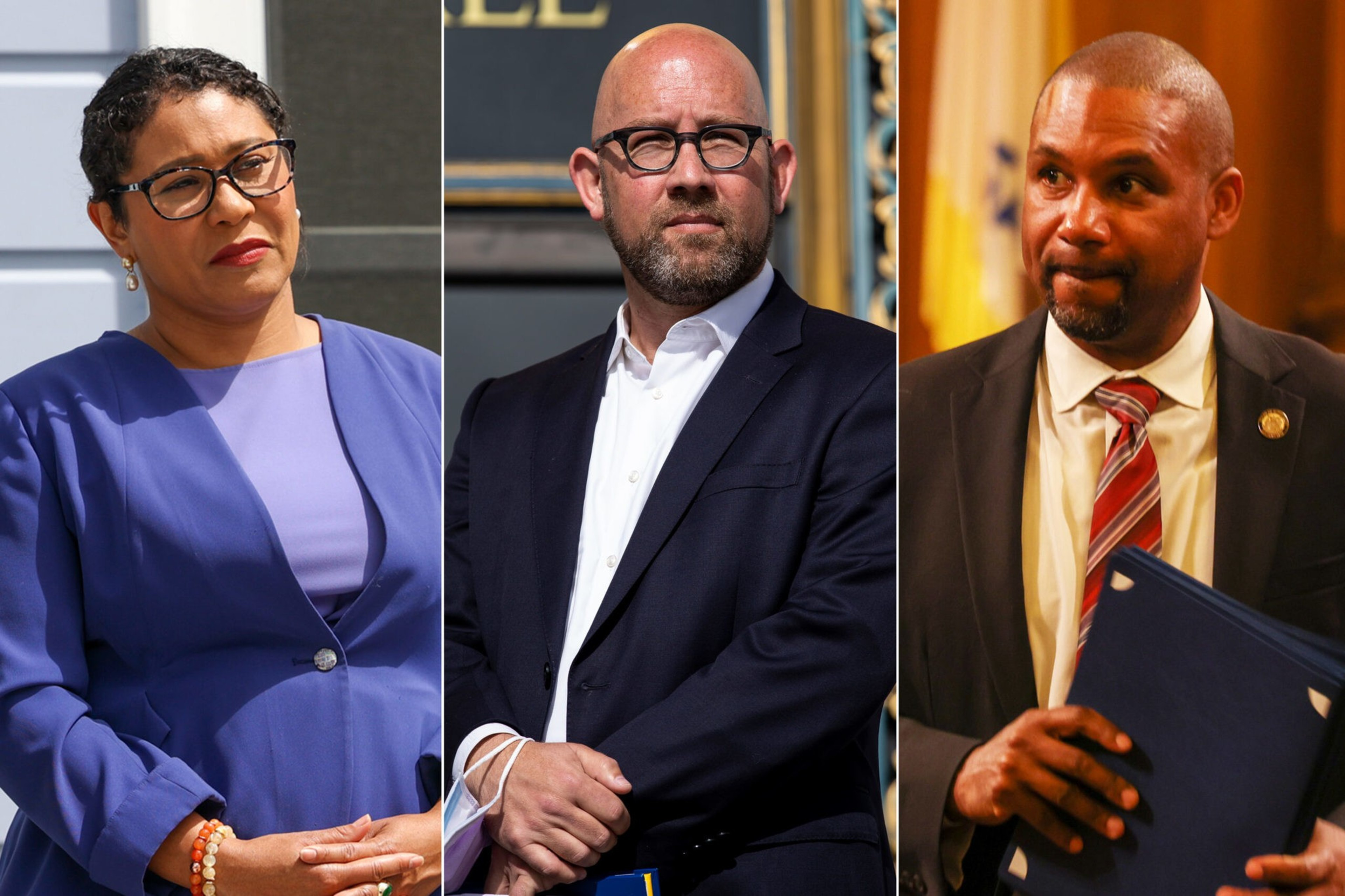 A woman in a blue outfit with glasses, a bald man in a navy blazer and white shirt, and a man in a suit holding a folder and wearing a striped tie.