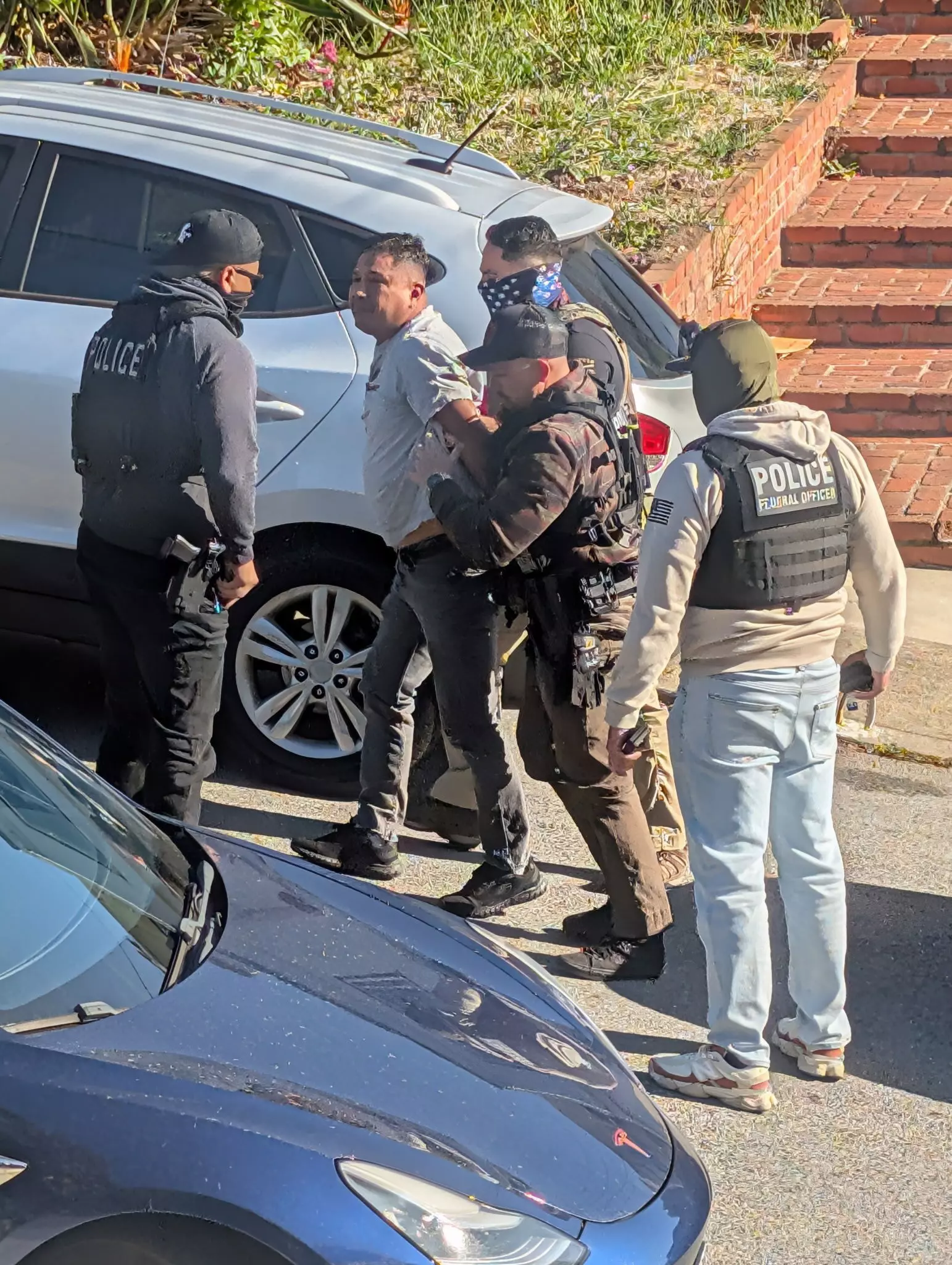 Video: Masked ICE officers seize man from car in Sunnyside