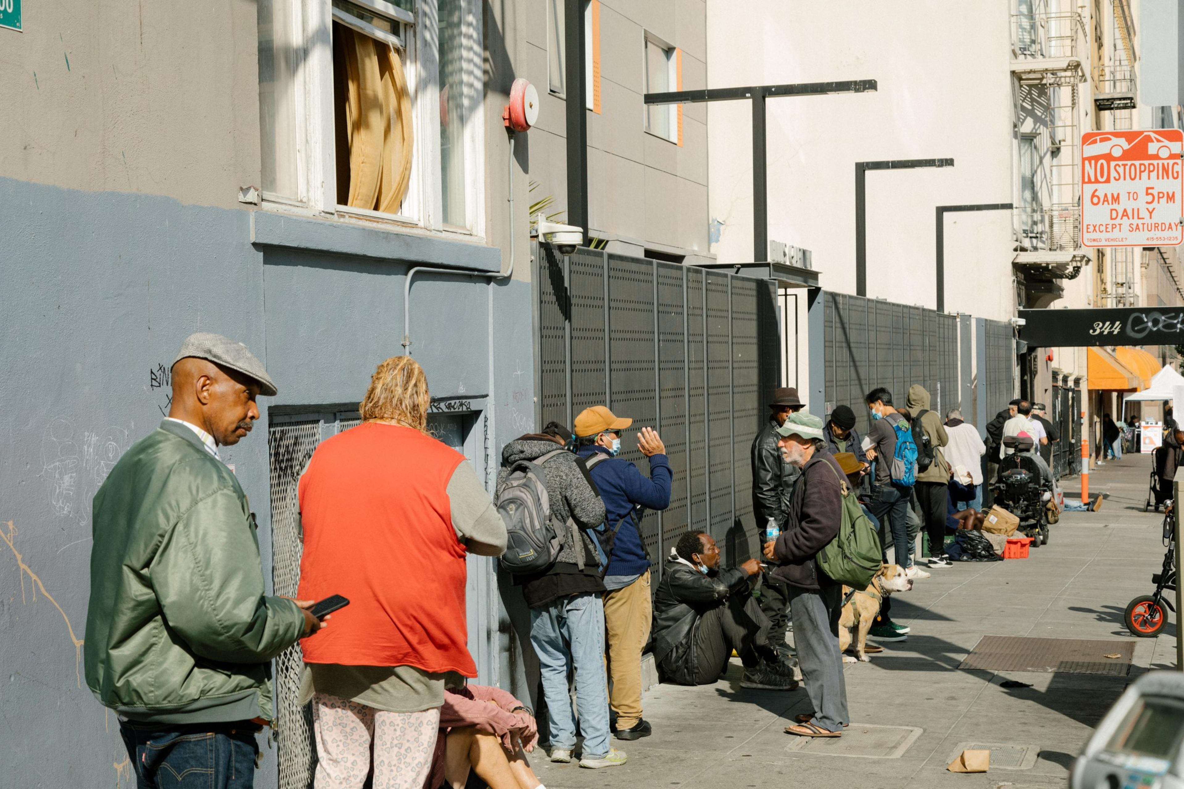 People stand in a line outside Glide Memorial Church.