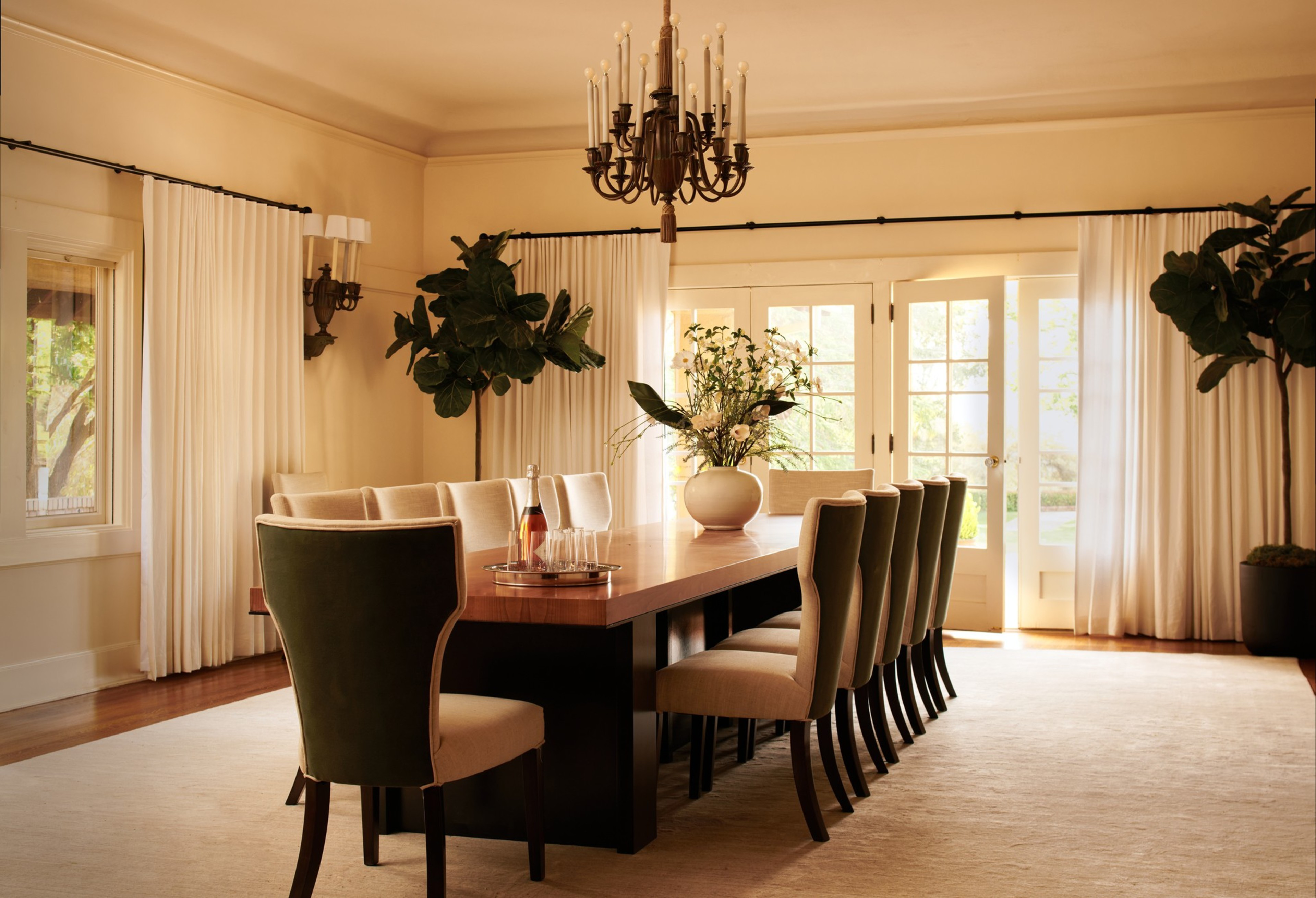 A dining room table inside a mansion. 