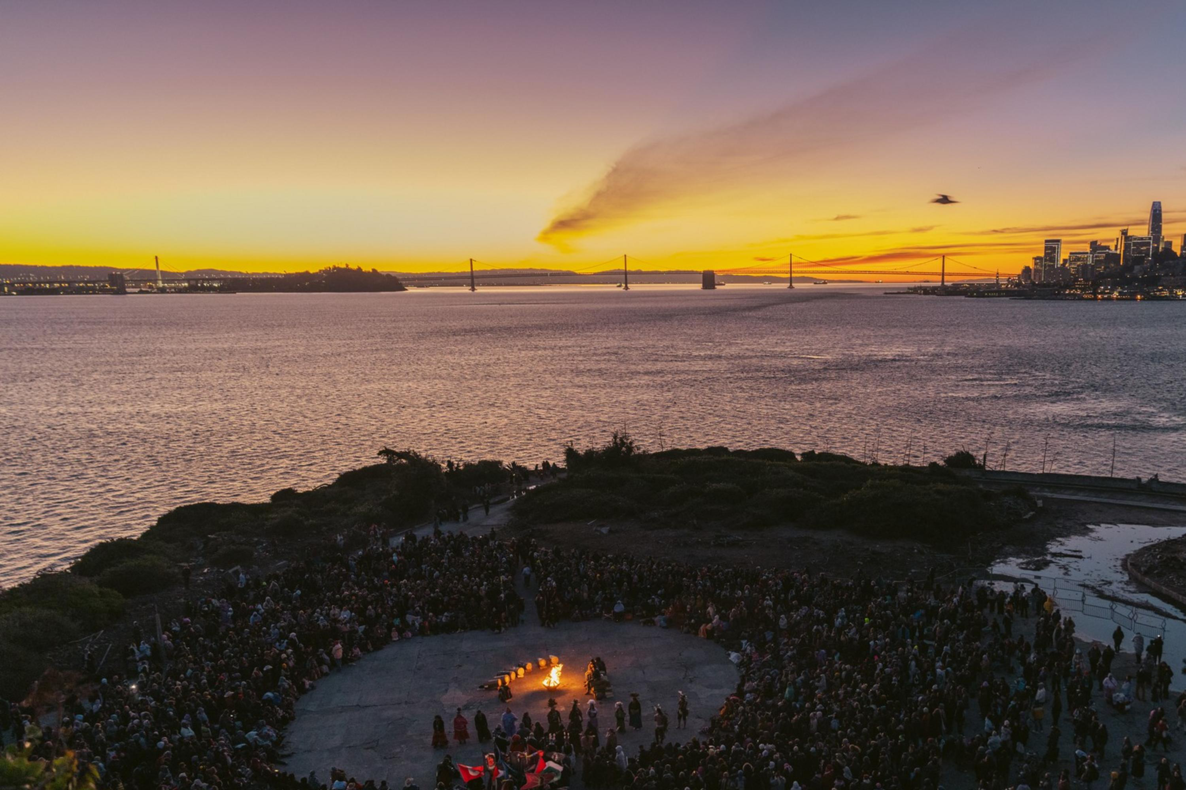 An overhead view of the indigenous sunrise gathering on Alcatraz Island