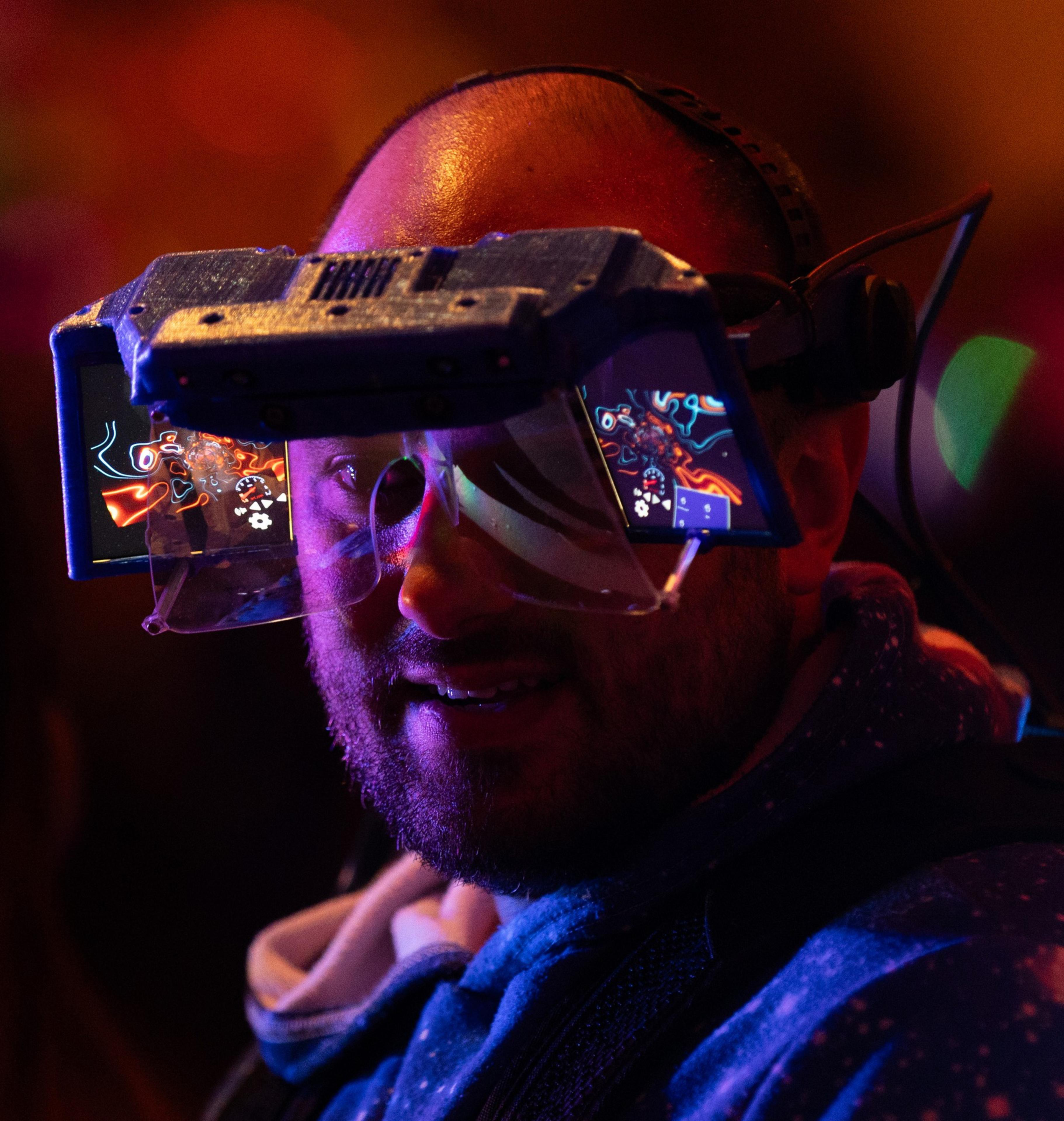 Dr. Damien Rompapas attends the SF Deep Tech Week launch party on the USS Hornet aircraft carrier in Alameda on Sunday, June 23, 2024. The event included tech showcases, demos and a rave. The USS Hornet is retired and operates as a sea, air and space museum.