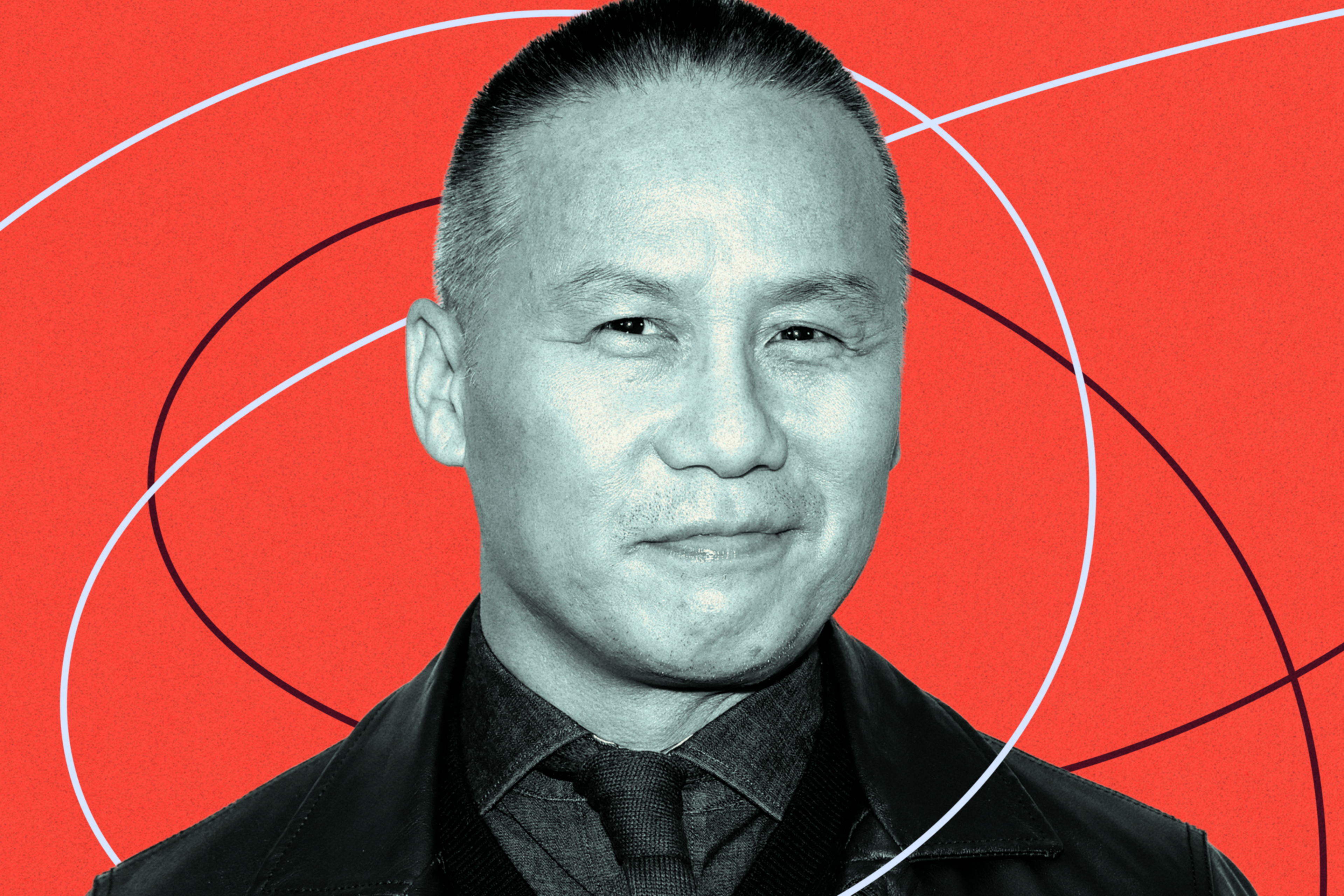 A man with short hair wears a dark shirt, tie, and jacket, smiling slightly against a bright red background with curved graphic lines.