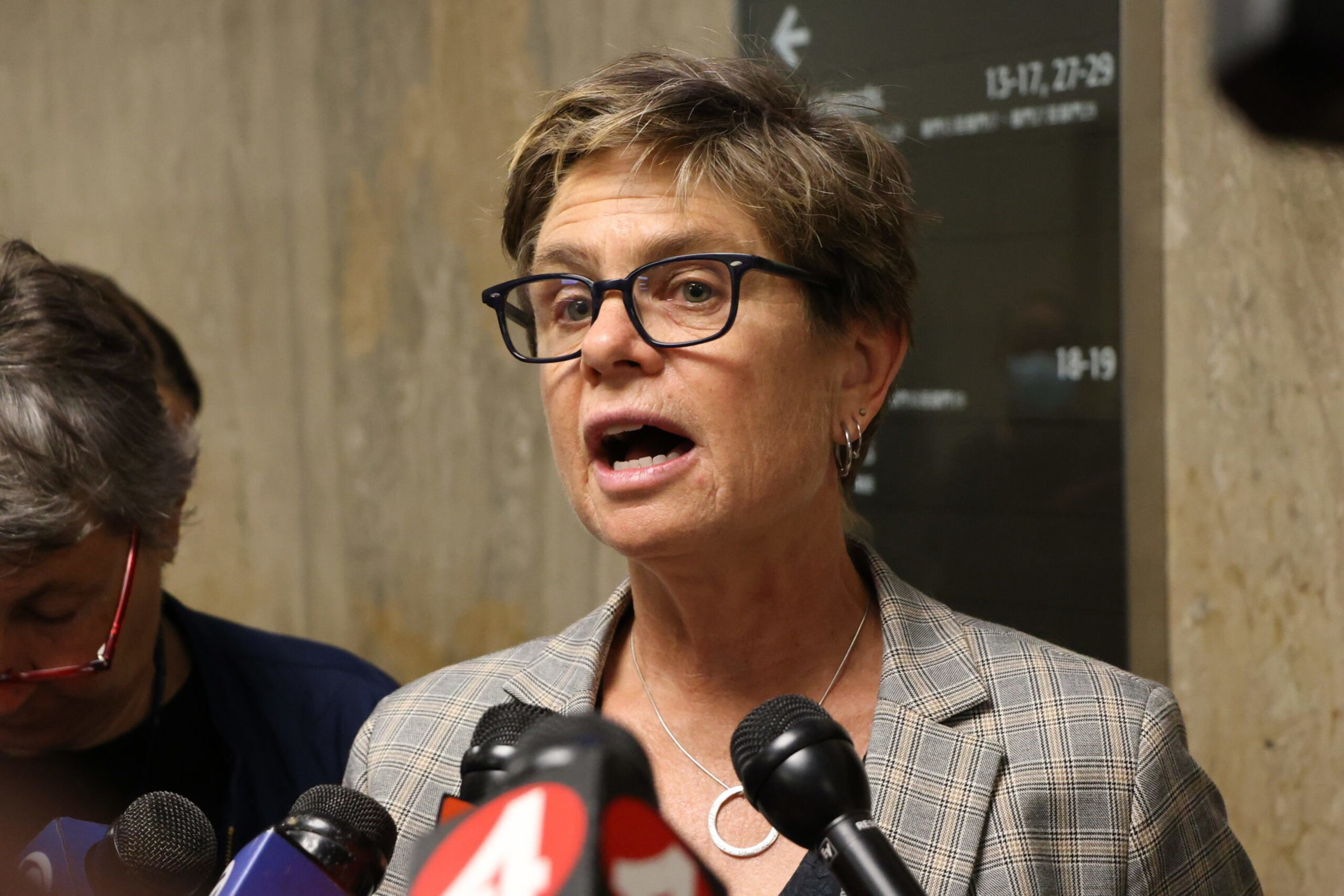 Attorney Kleigh Hathaway speaks to the press.