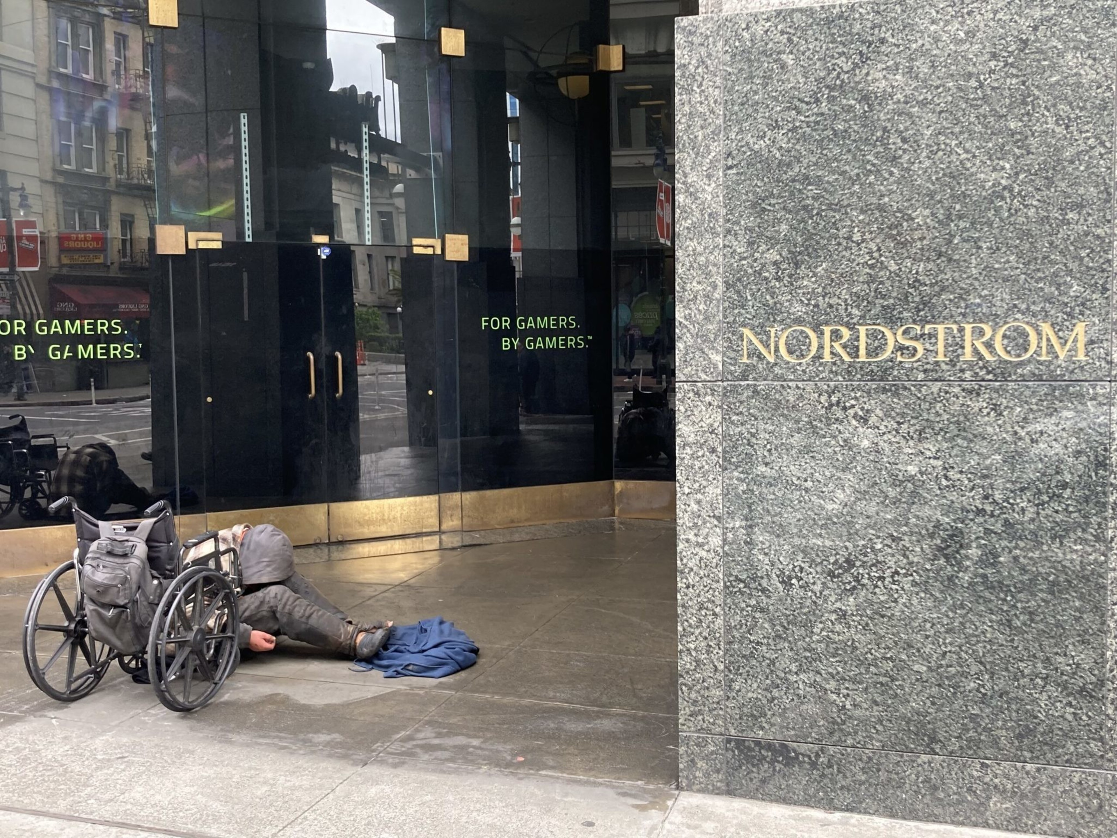Pedestrians pass Westfield San Francisco Centre on Market Street in Downtown San Francisco on May 3, 2023. | Justin Katigbak for The Standard