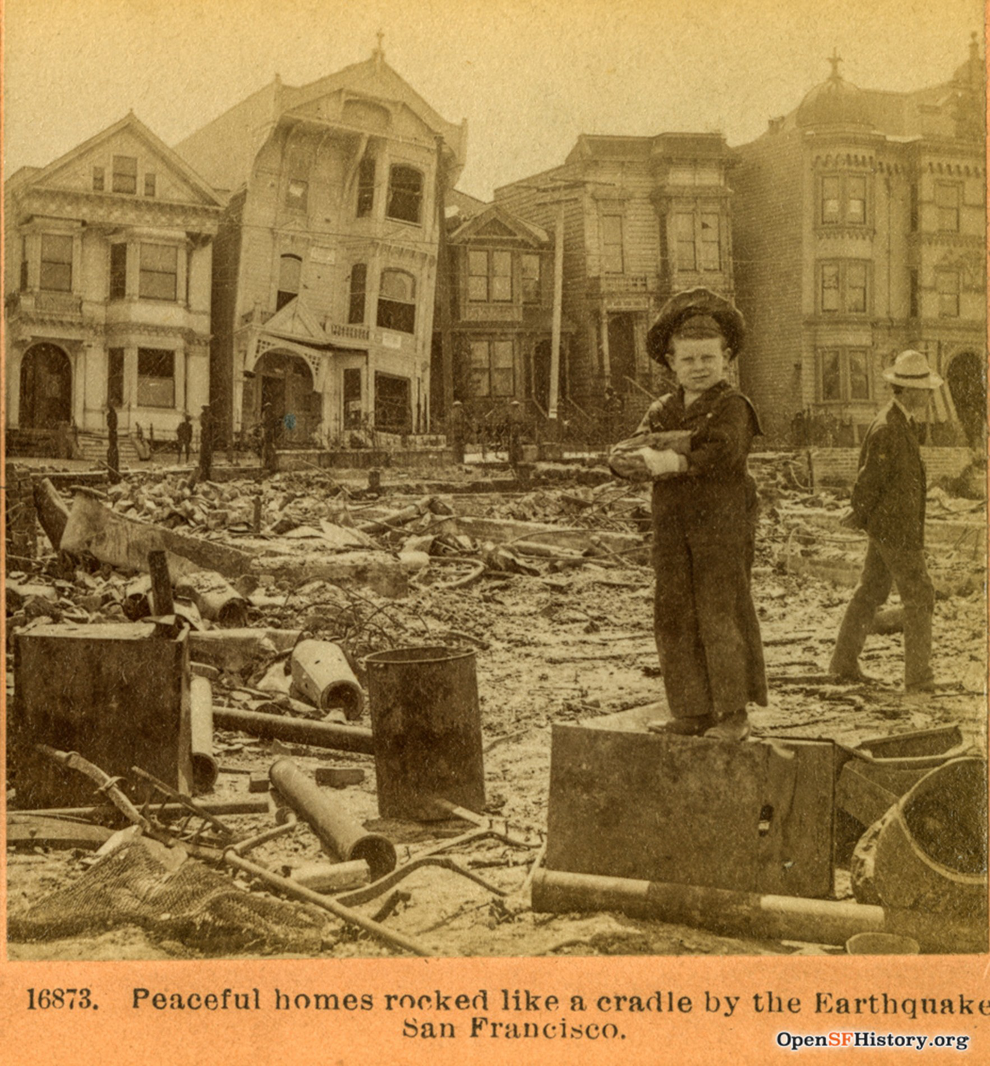 A child stands amid rubble and debris with damaged Victorian houses leaning in the background after an earthquake in San Francisco.
