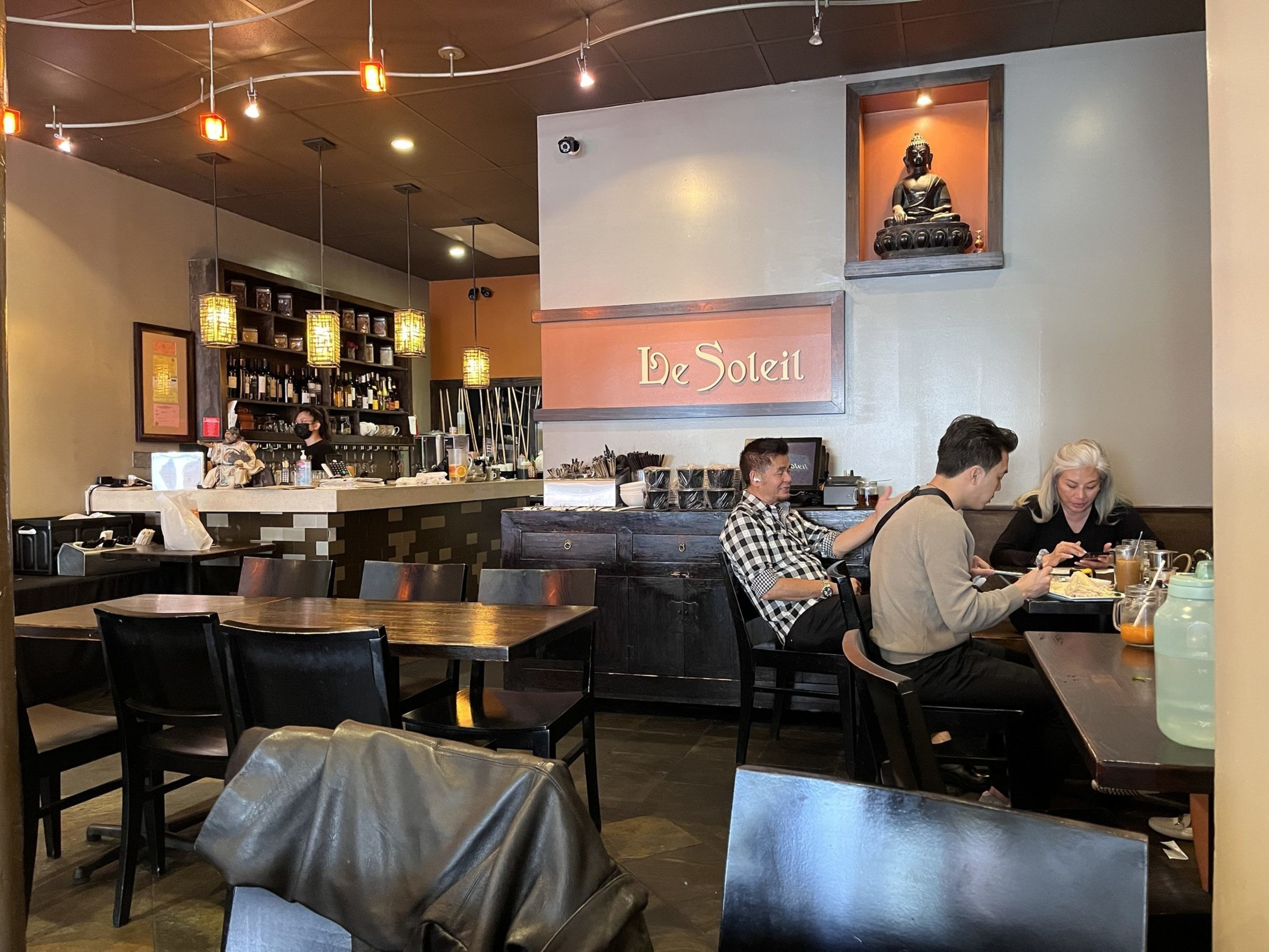 People eat at tables in a restaurant