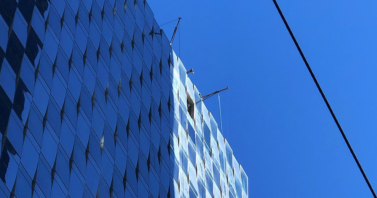 Glass fell from skyscraper’s roof during construction work, smashing ...