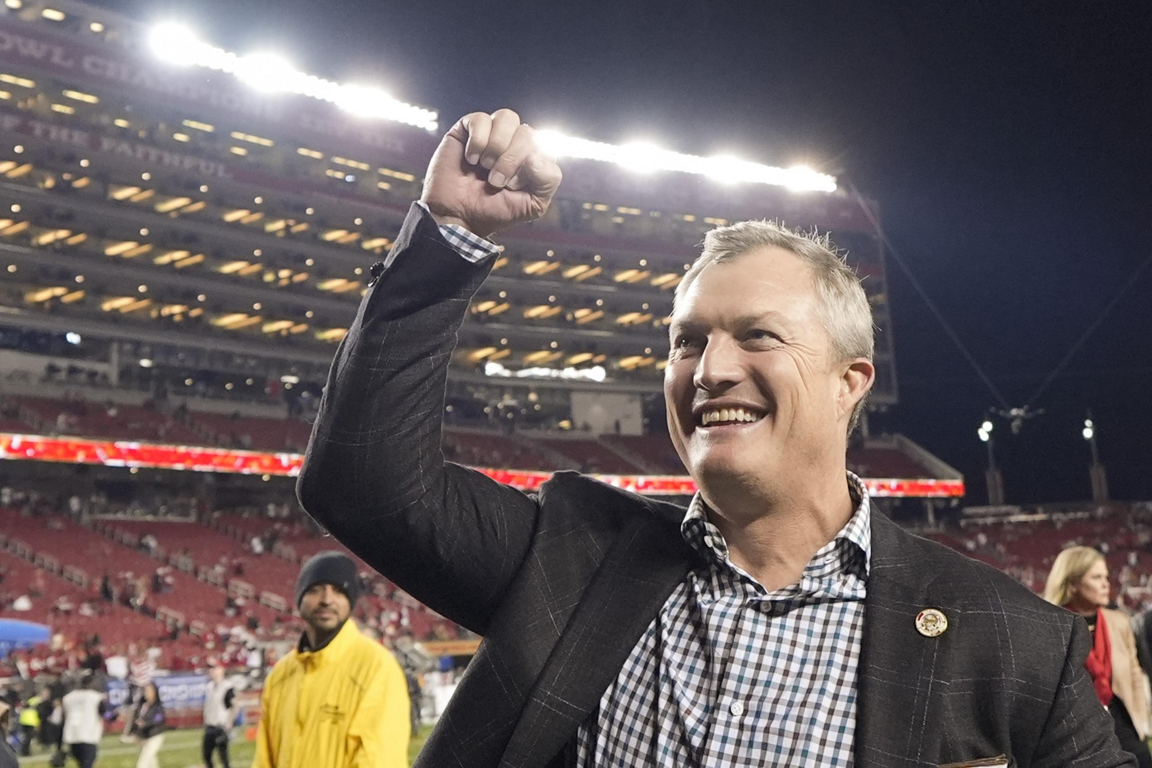 John Lynch celebrates