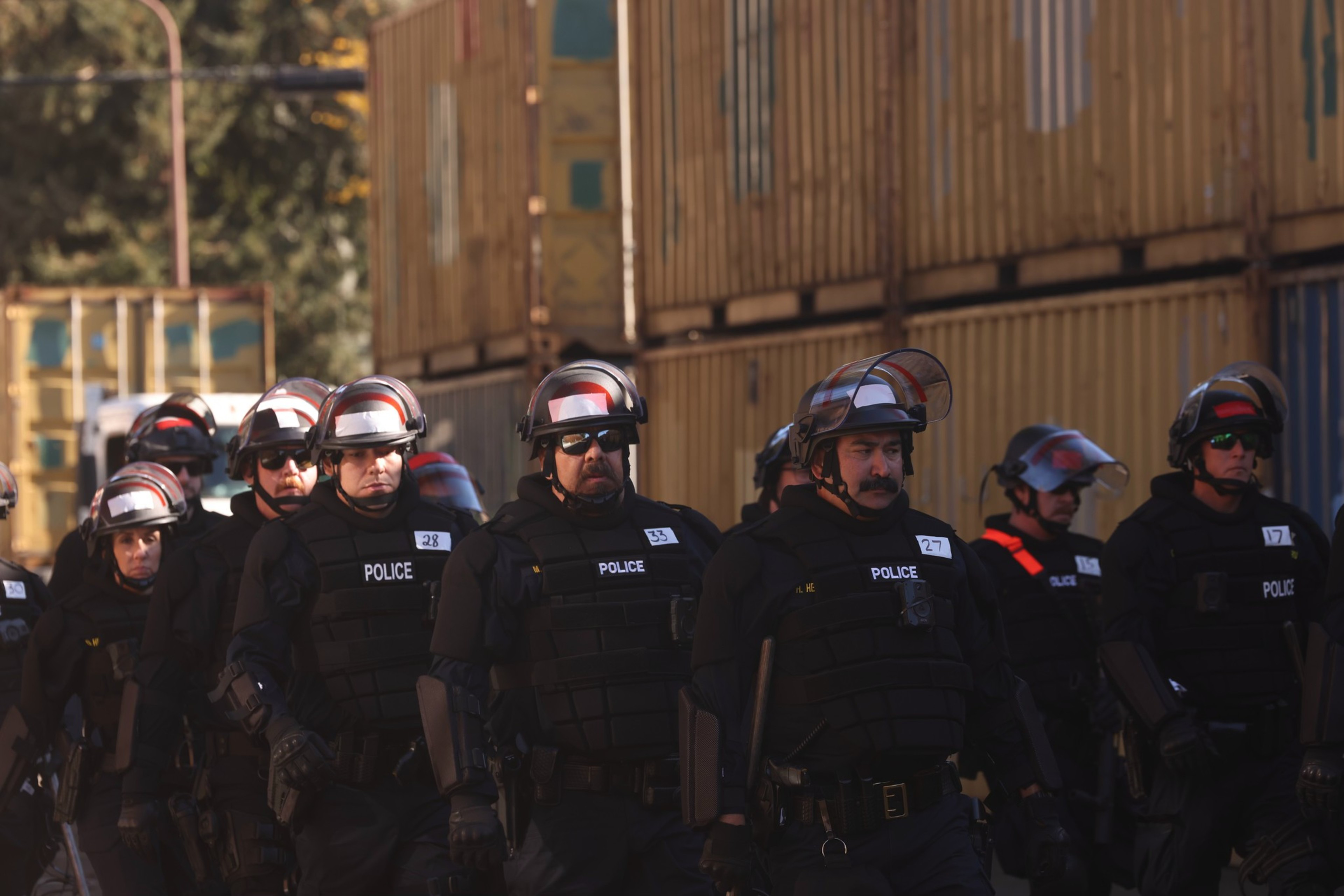 Law enforcement gather along Haste Street to prevent people from entering People's Park.