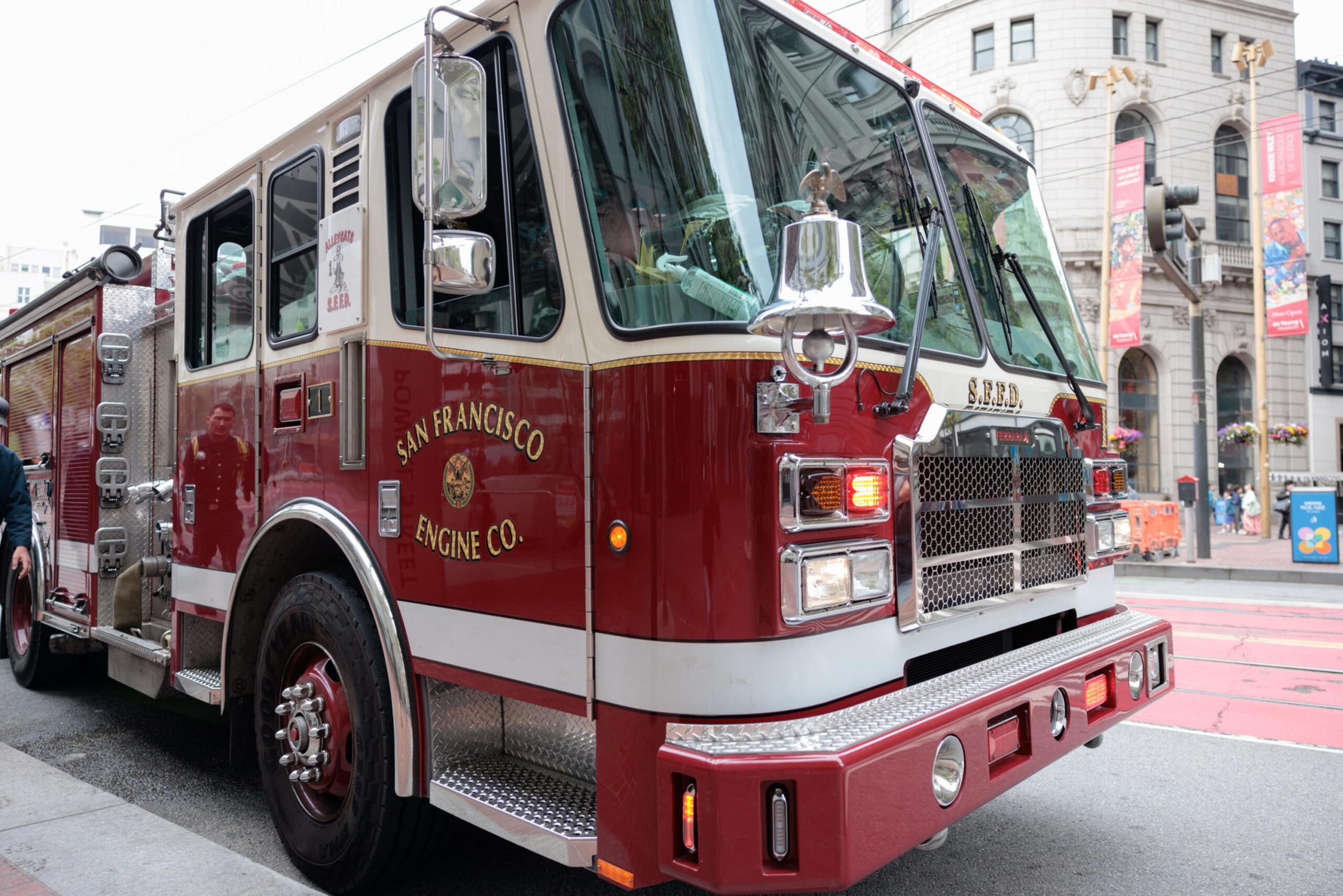 A San Francisco Fire Department (SFFD) truck is parked on Market St. in San Francisco, on June 6, 2023. For the past two years, while paramedics and emergency medical teams have often been stuck sitting idle in emergency rooms, data shows that people experiencing critical medical emergencies have waited too long for an ambulance to arrive. | Isaac Ceja/The Standard