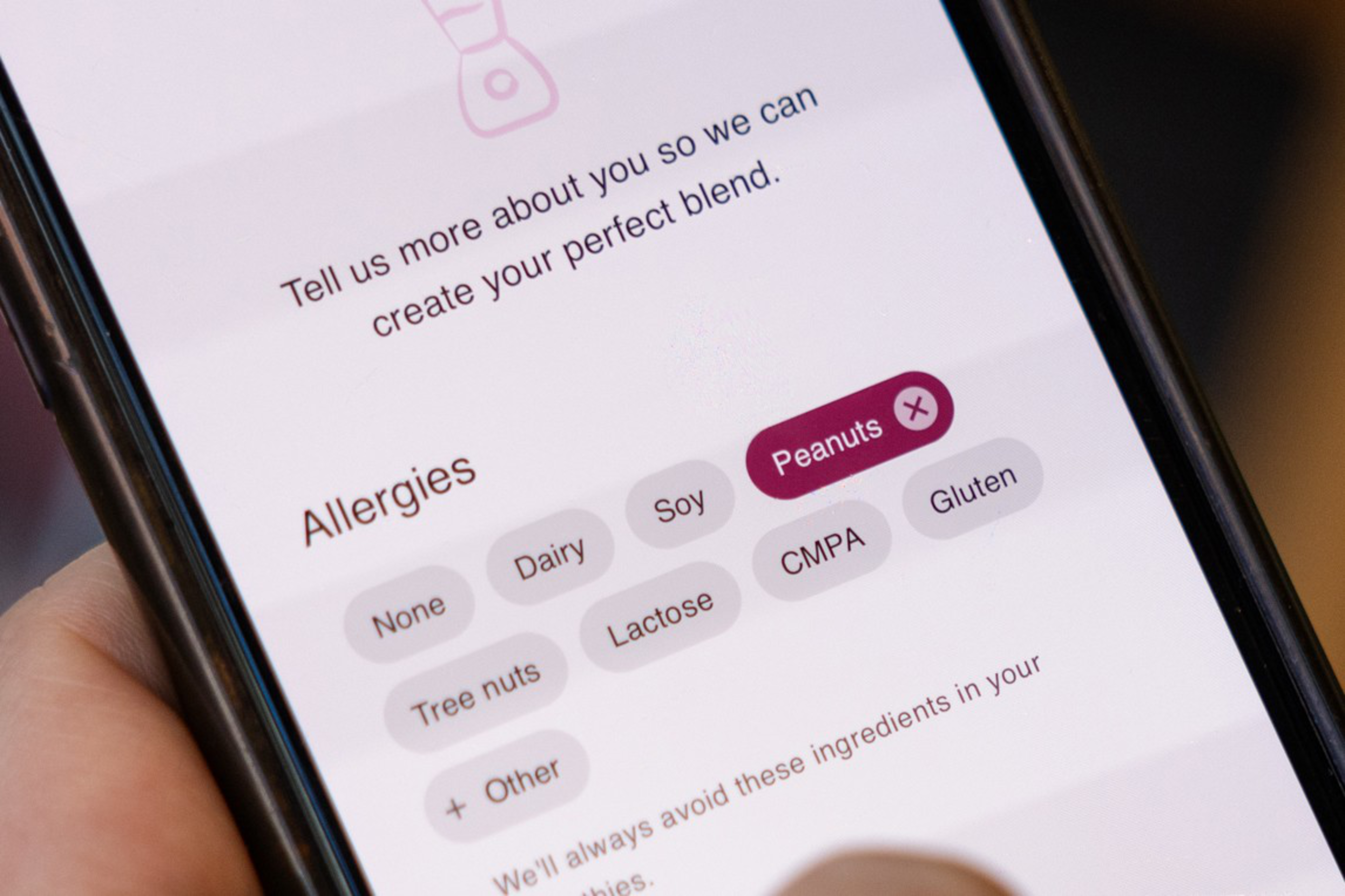 A phone screen shows an allergy selection with options like dairy, soy, peanuts (selected), gluten, tree nuts, lactose, CMPA, and other.
