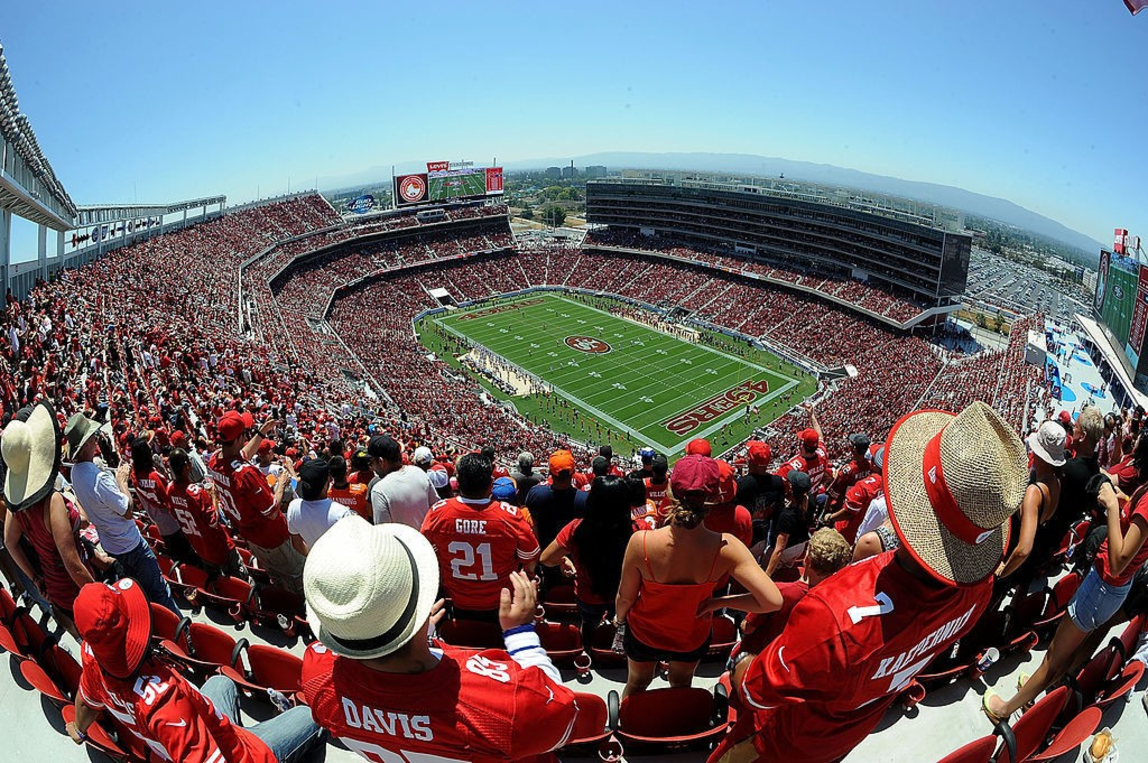 people sit in stadium