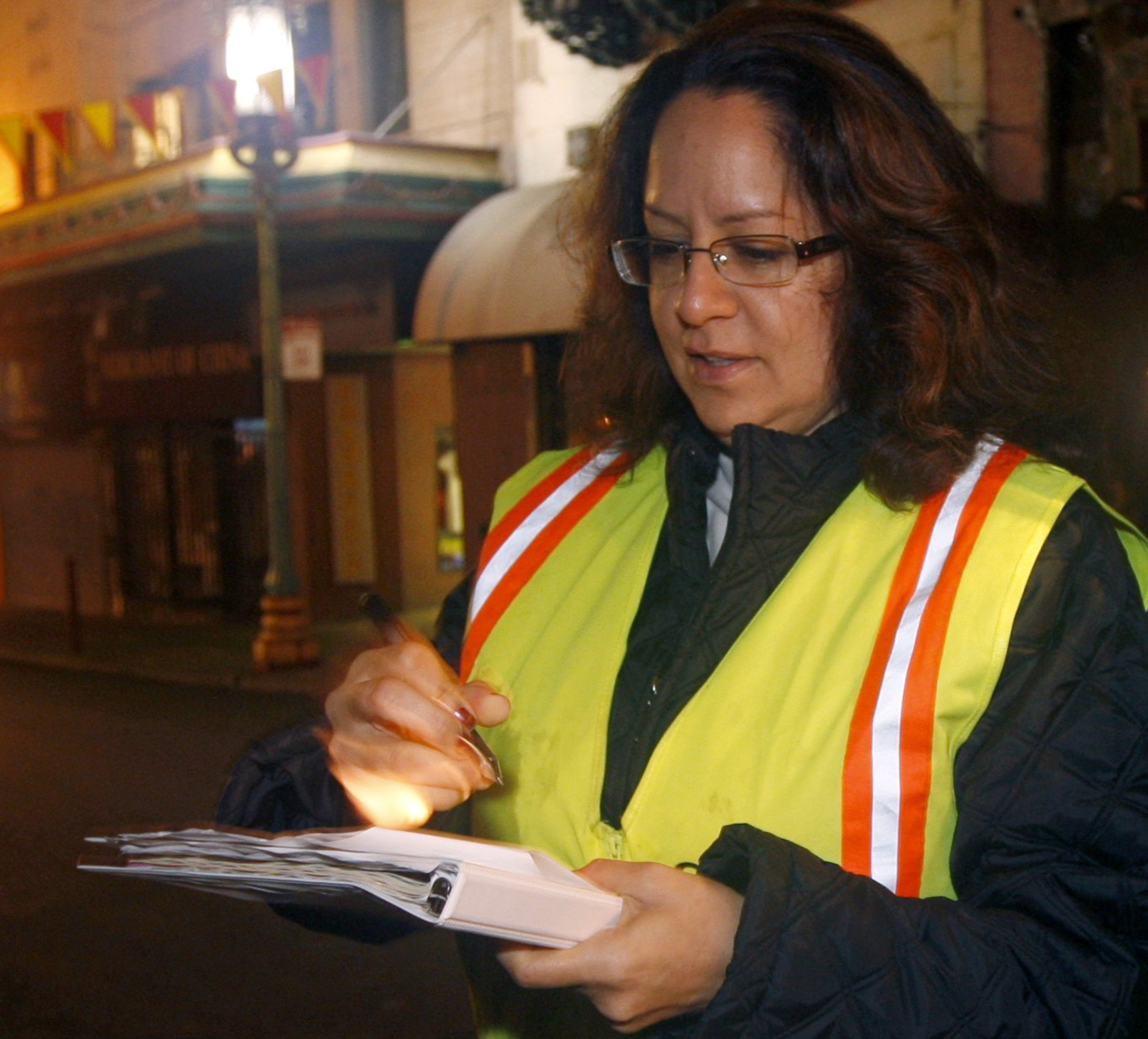 Sandra Zuniga wears a safety vest.