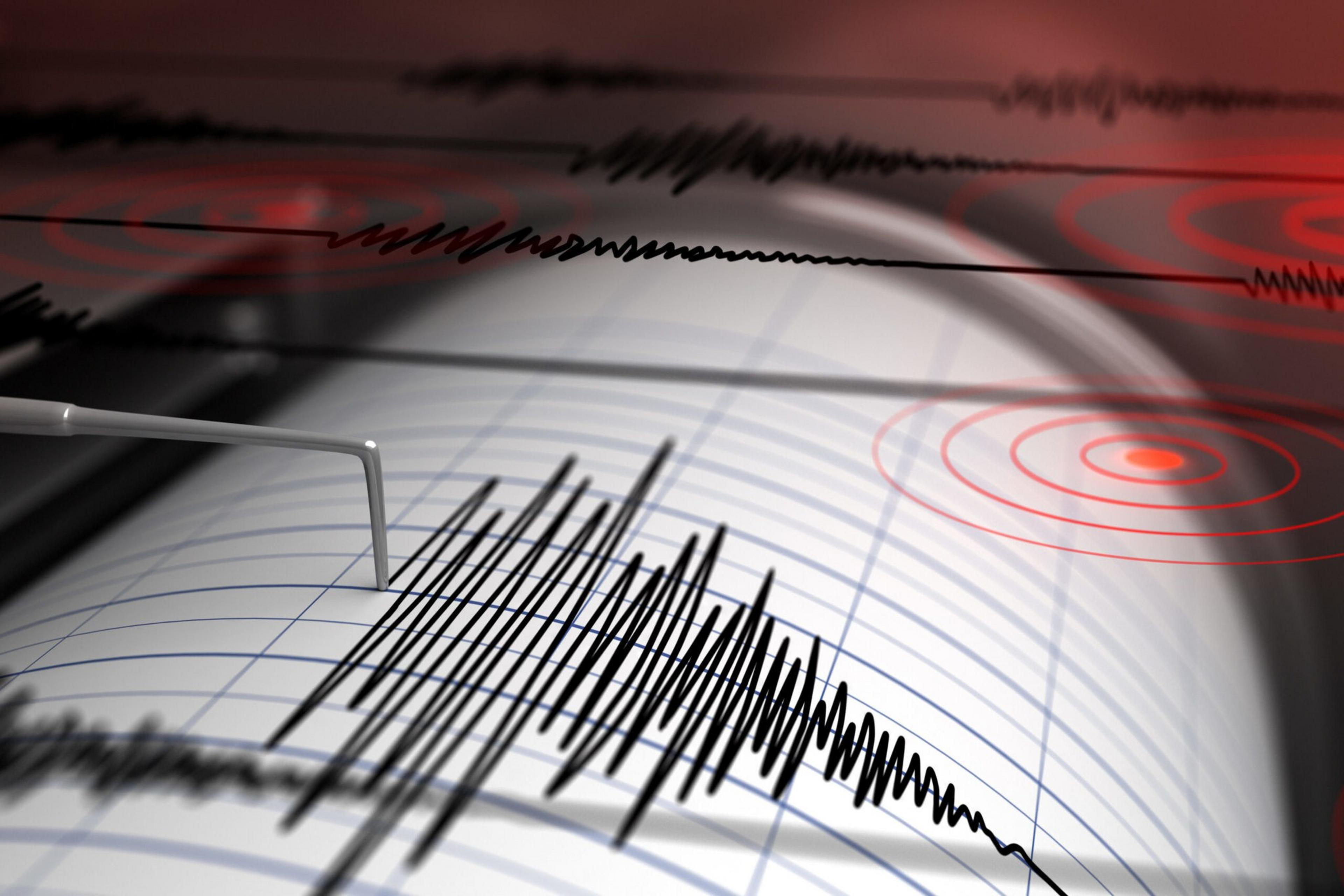 A seismometer printing line measuring the richter scale of an earthquake. | Shutterstock