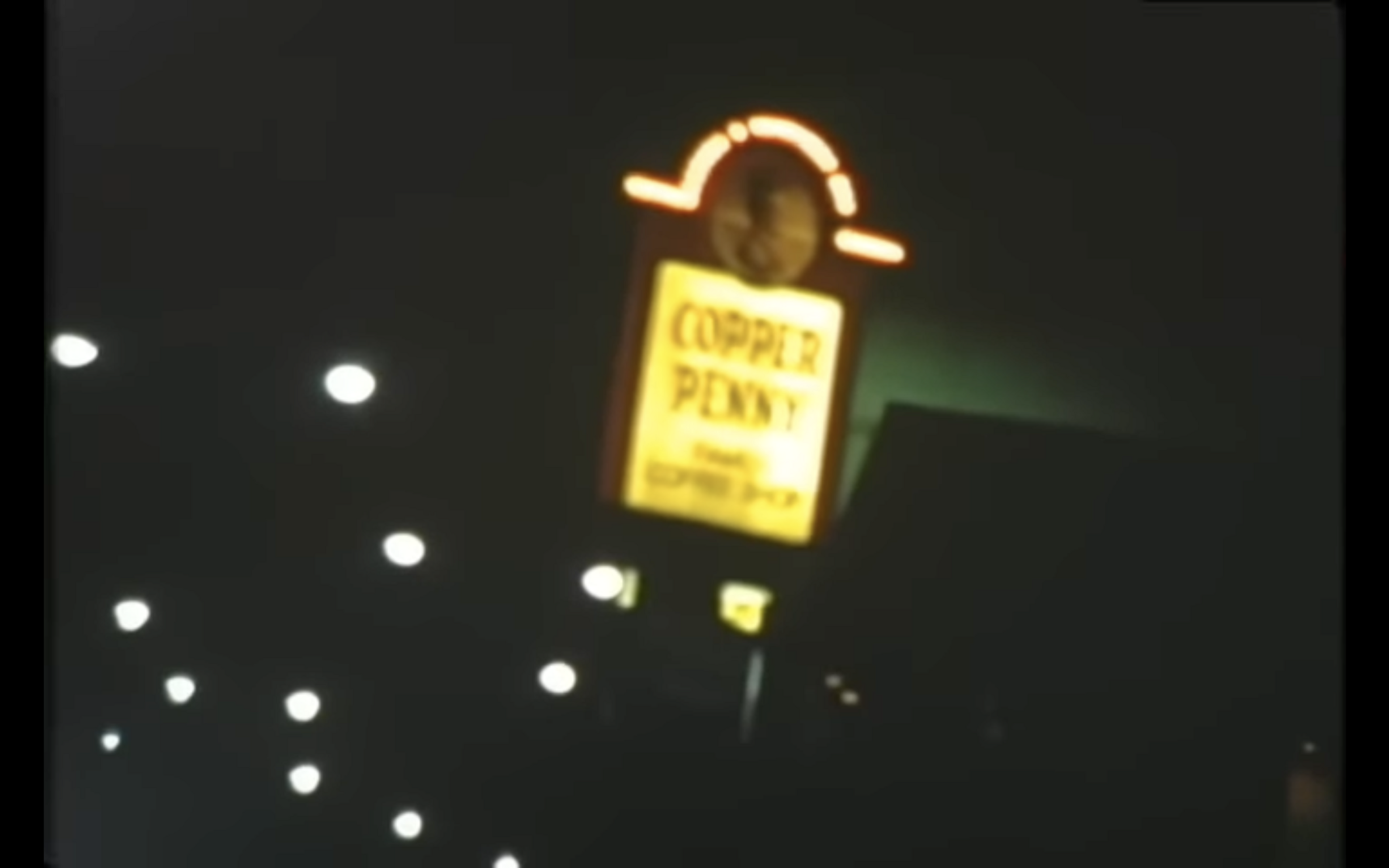 A glowing sign reads &quot;COPPER PENNY.&quot;