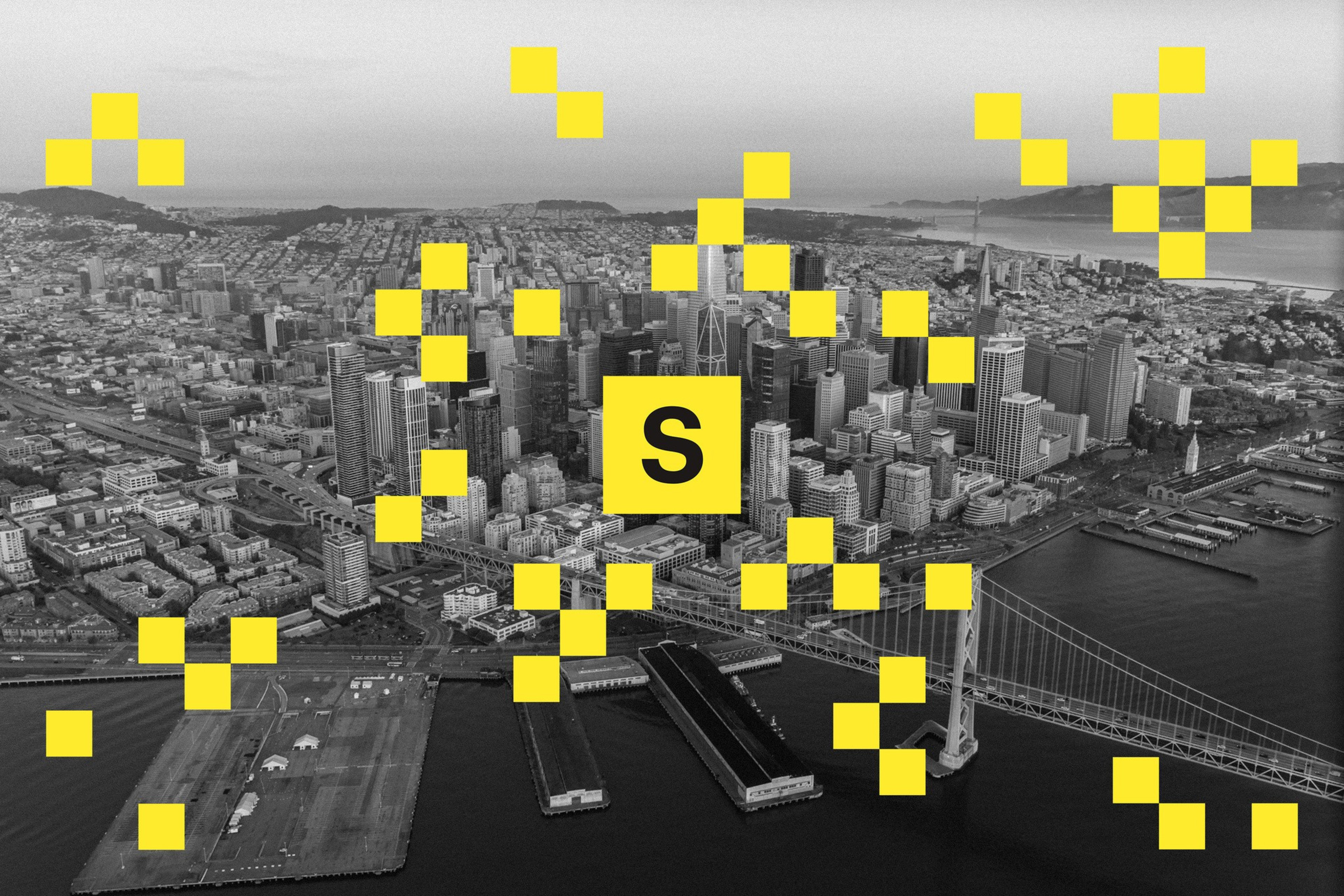 The Standard logo hovers over the San Francisco cityscape.