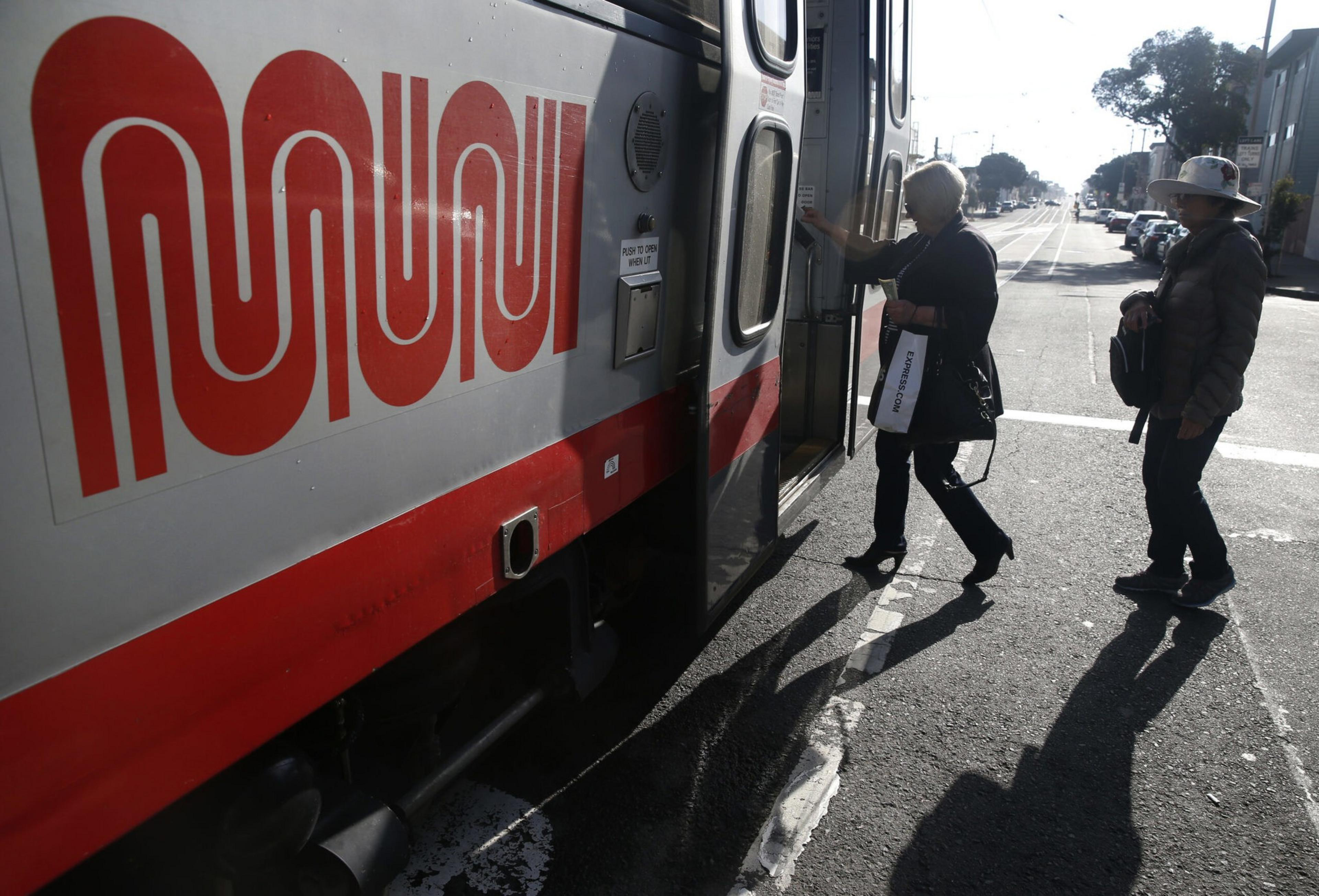 Passengers board an inbound N-Judah streetcar at 48th Avenue in San Francisco, Calif. on Thursday, Aug. 27, 2015. Muni is getting ready to roll out a second round of major service improvements systemwide. | Paul Chinn/The San Francisco Chronicle via Getty