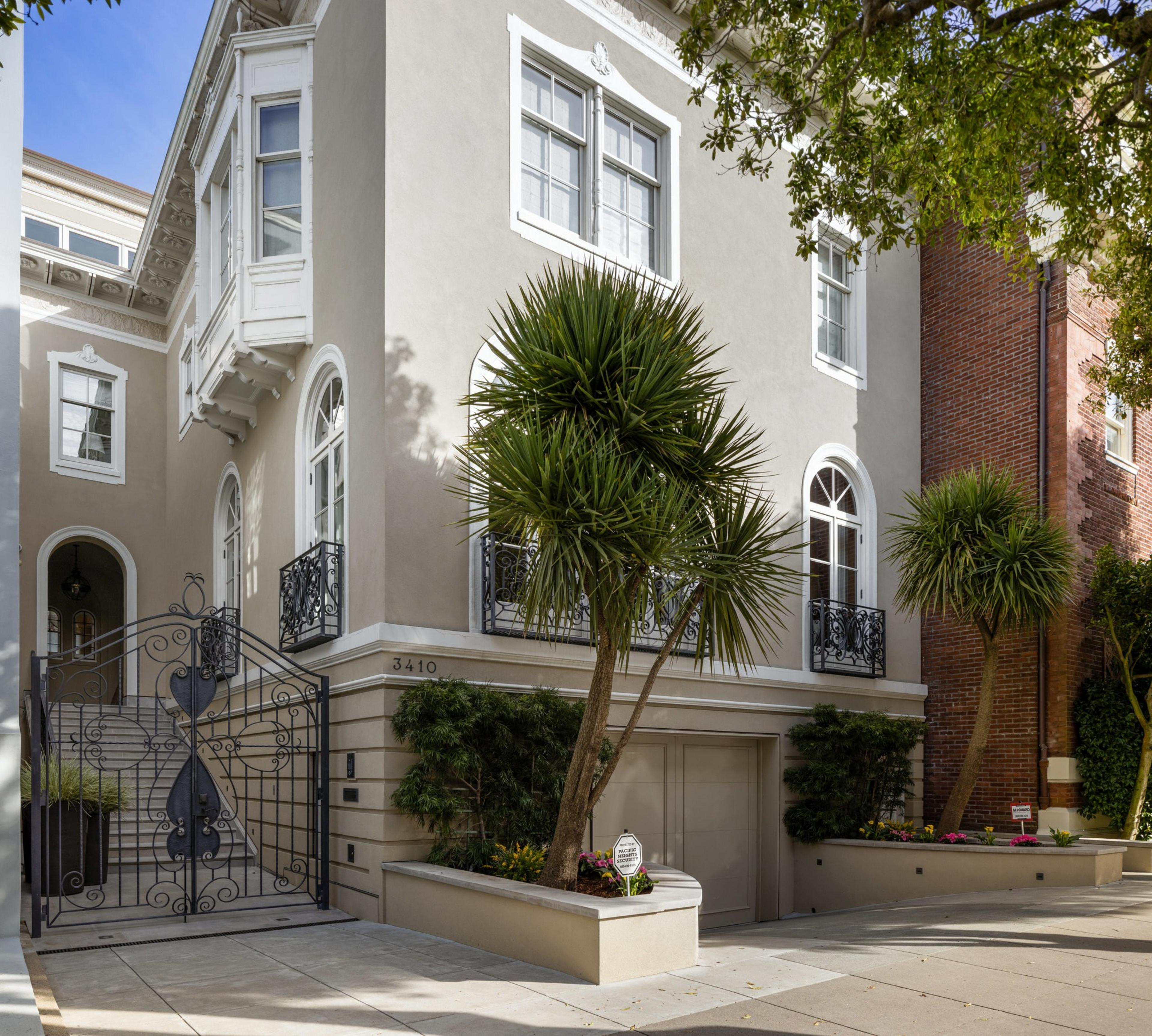 A mansion is seen from the front