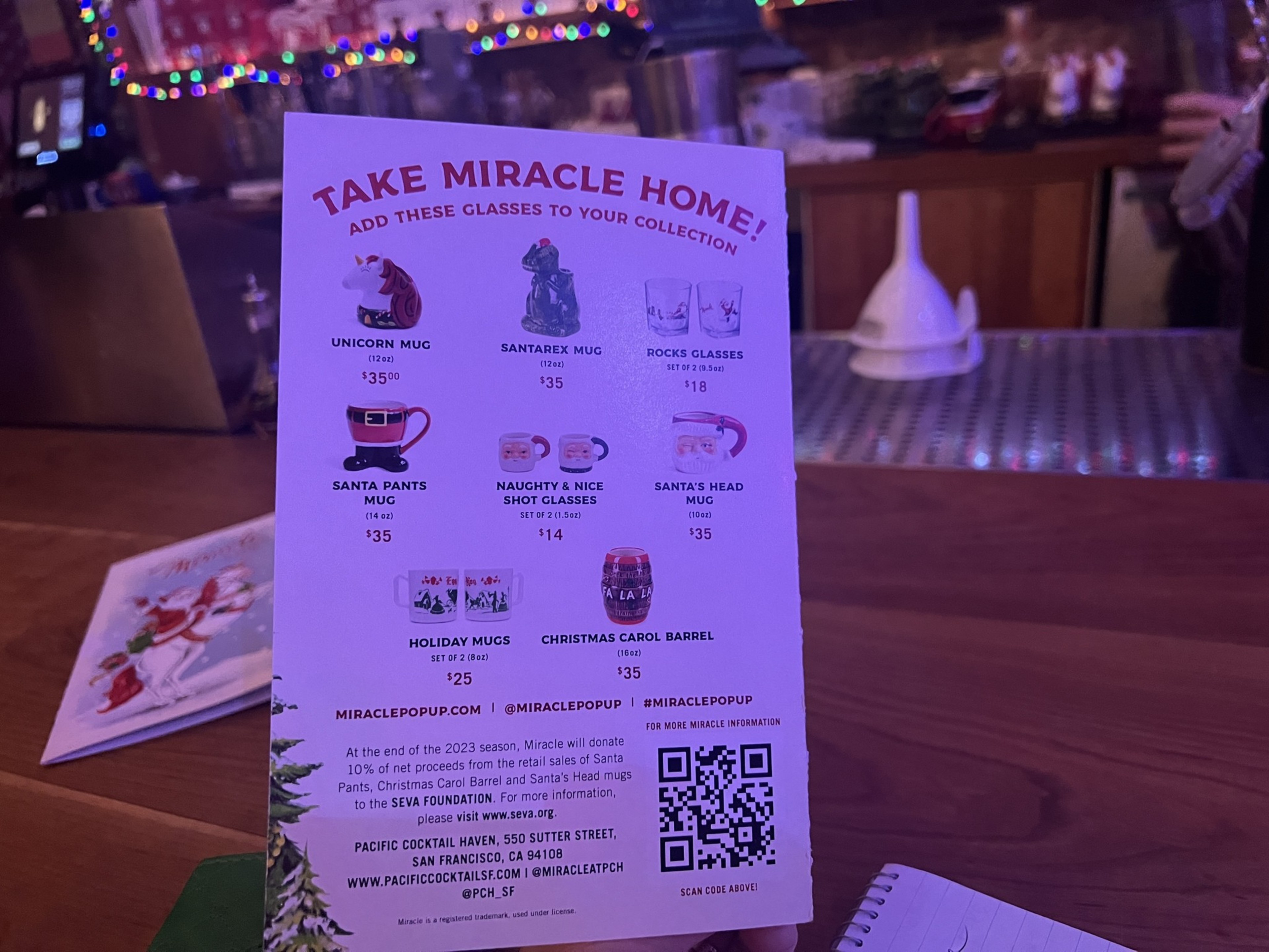 A menu shows an array of Christmas glassware for sale. 