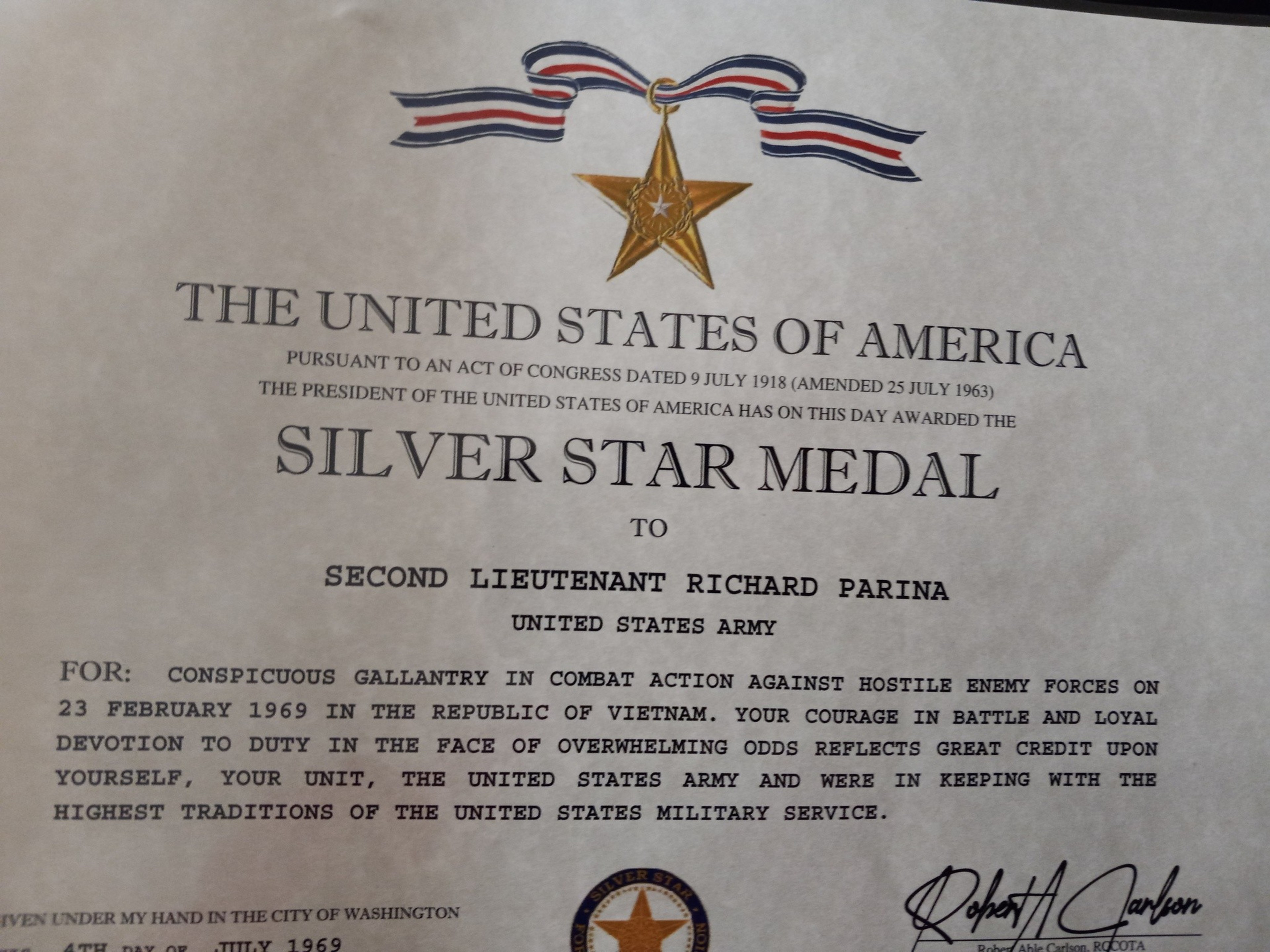A document that claims to be a Silver Star certificate for Richard Parina.