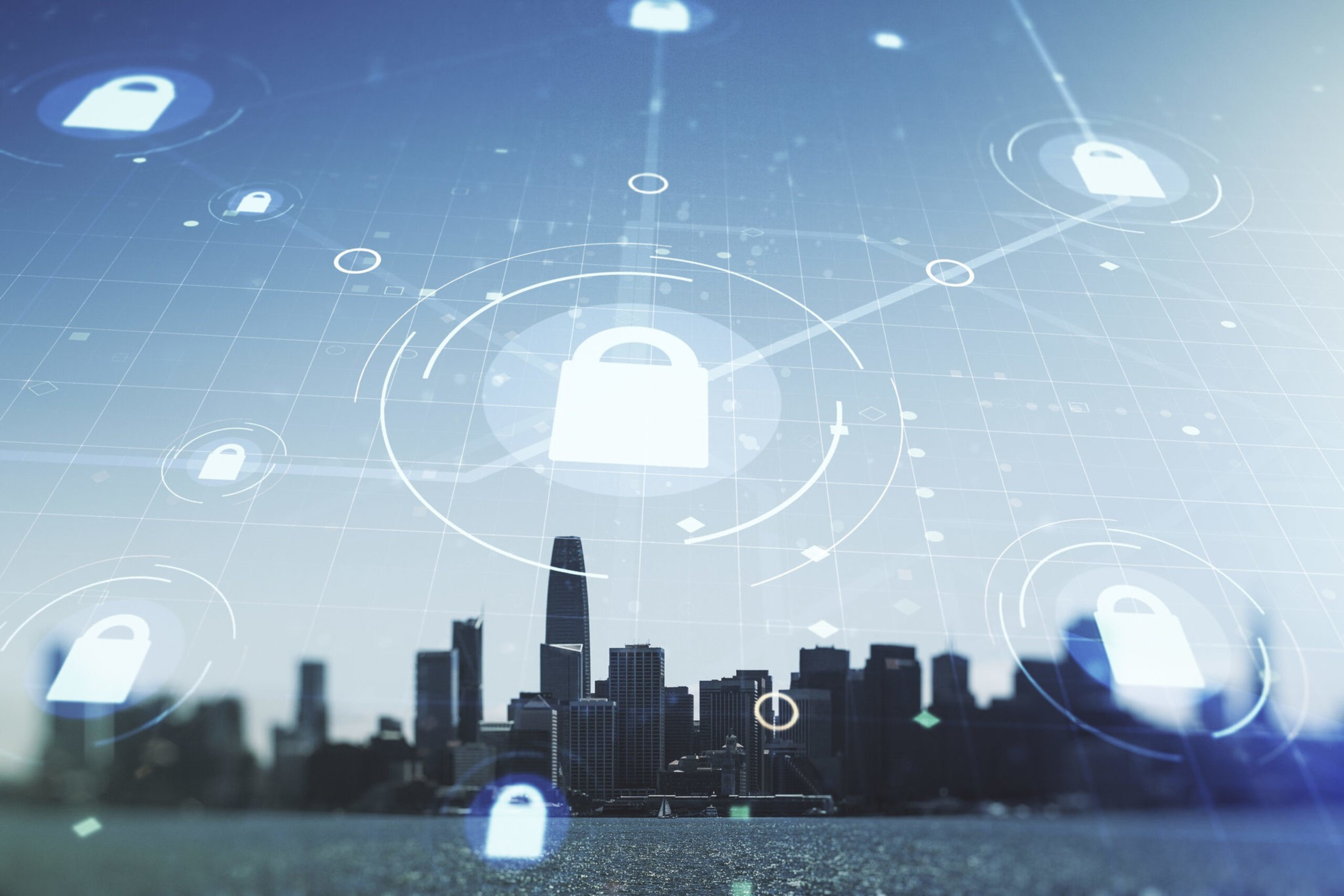A city skyline behind a digital overlay of interconnected padlock icons representing cybersecurity or data protection.