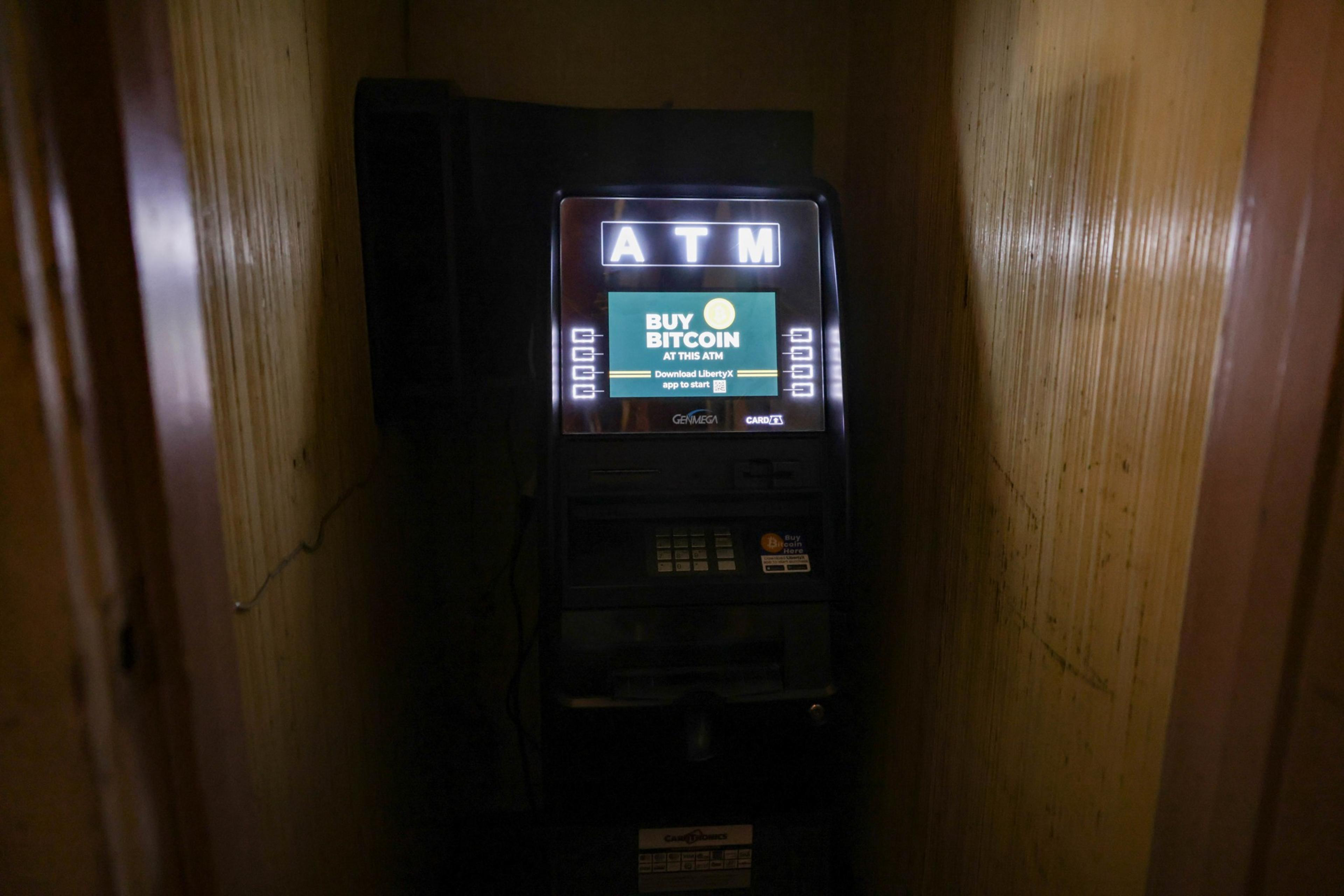 A new ATM machine sits in a telephone booth at Clooneyâ€™s Pub on Tuesday, Dec. 12, 2023. The bar has had to buy a new ATM machine and relocate it as a result of the ATM robbery on October 24. Thieves have attempted to or have robbed at least 16 ATMâ€™s in San