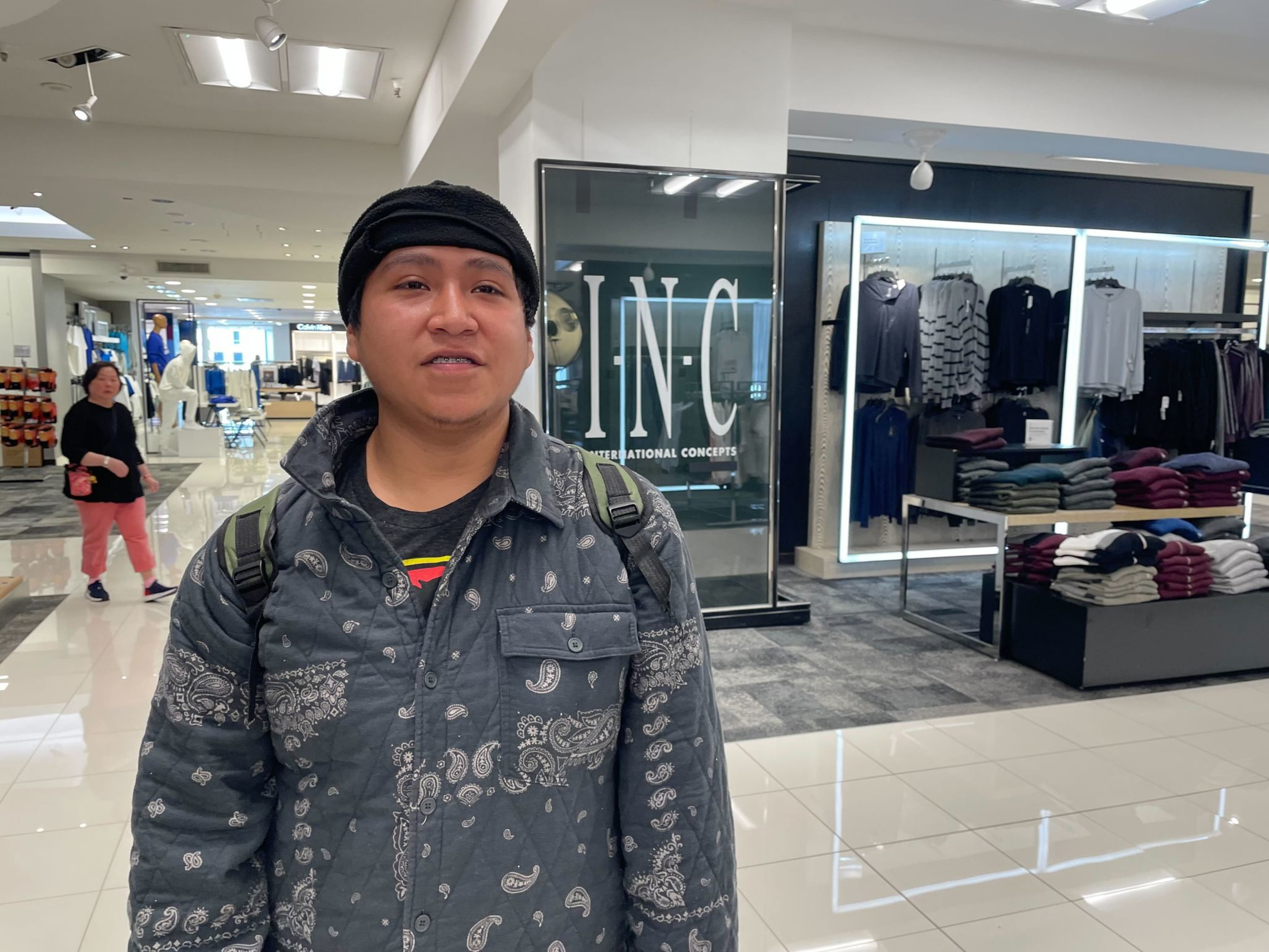 Man inside store.