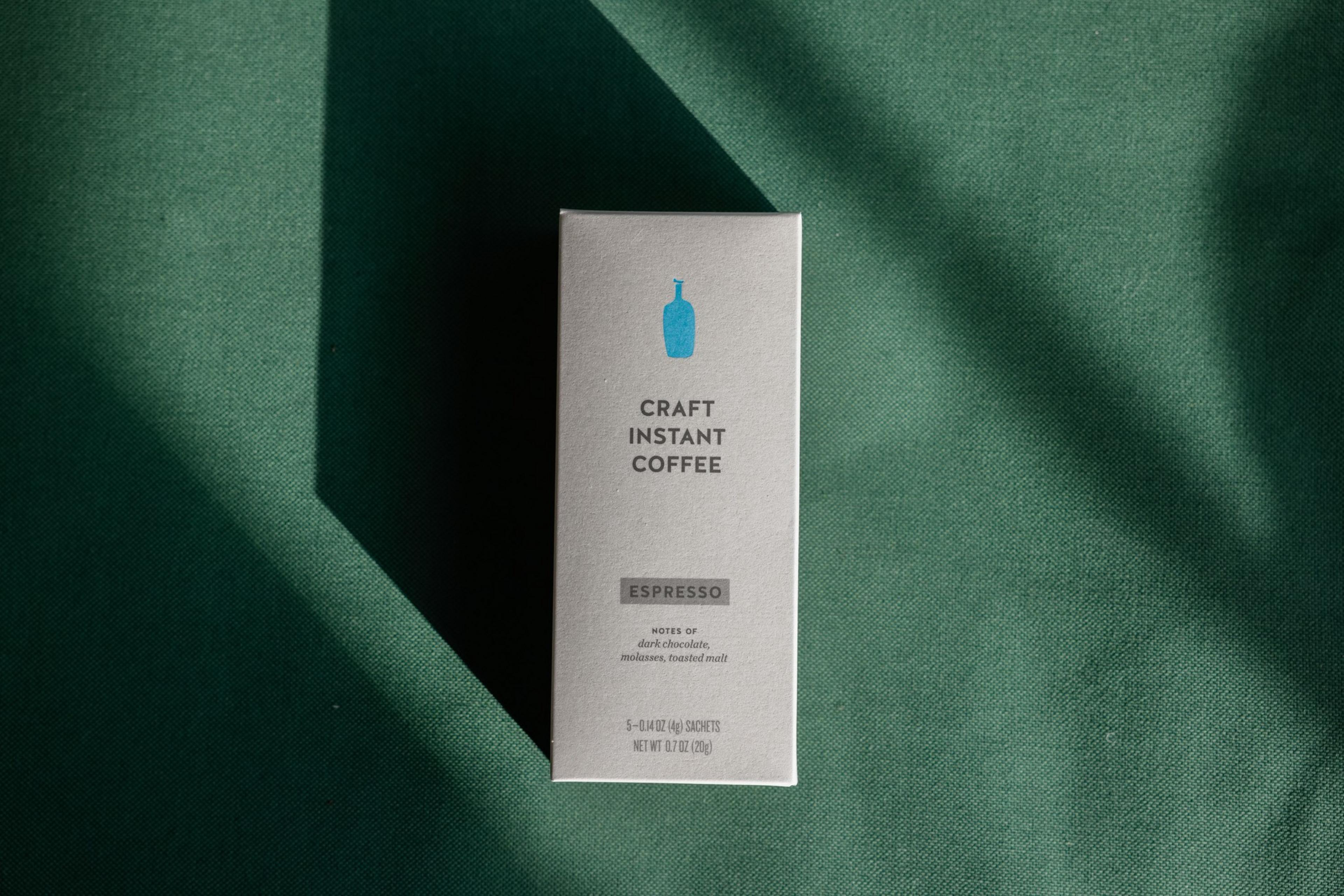 A top-down product shot of an instant coffee box from Blue Bottle.