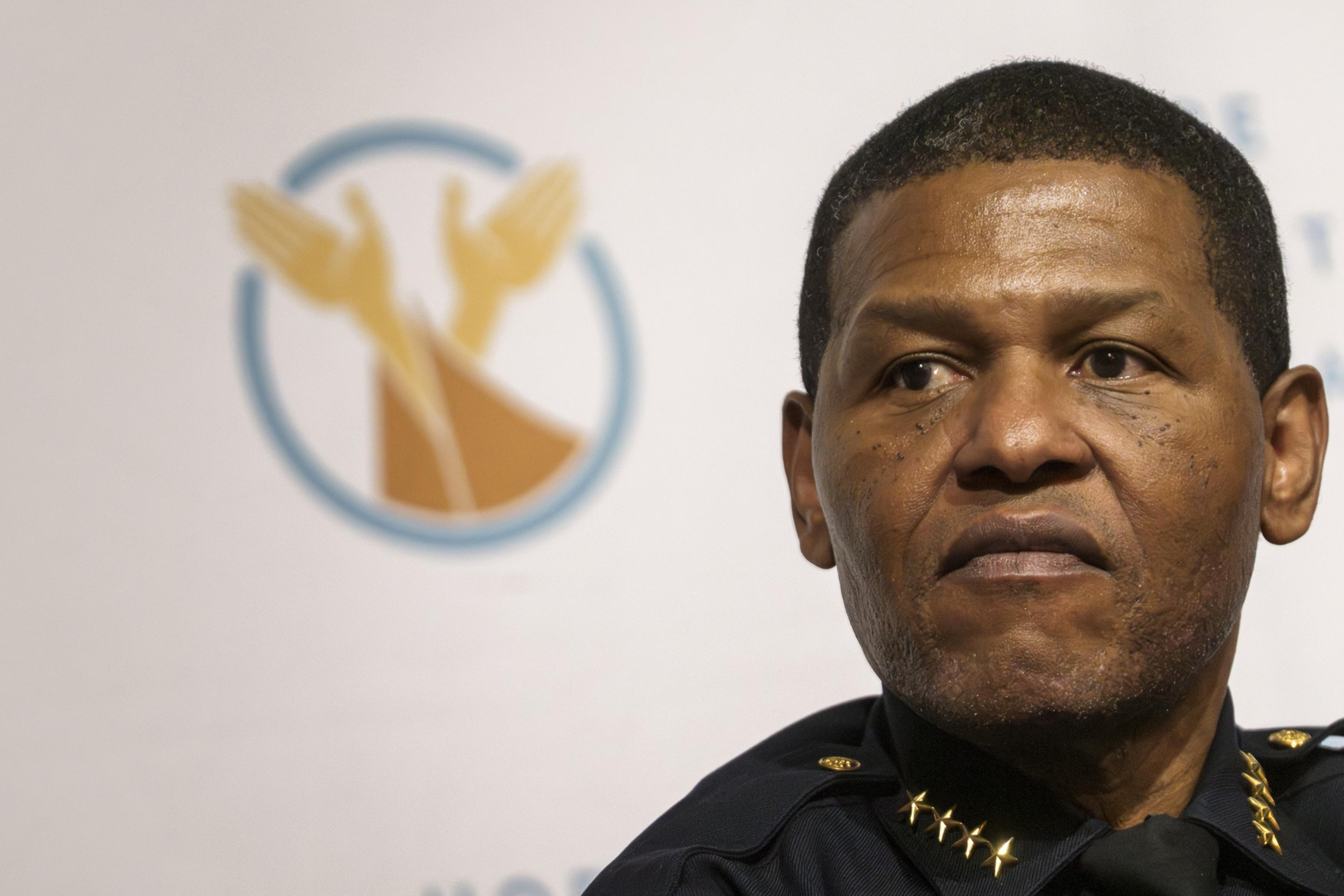 Police Chief Bill Scott grimaces.