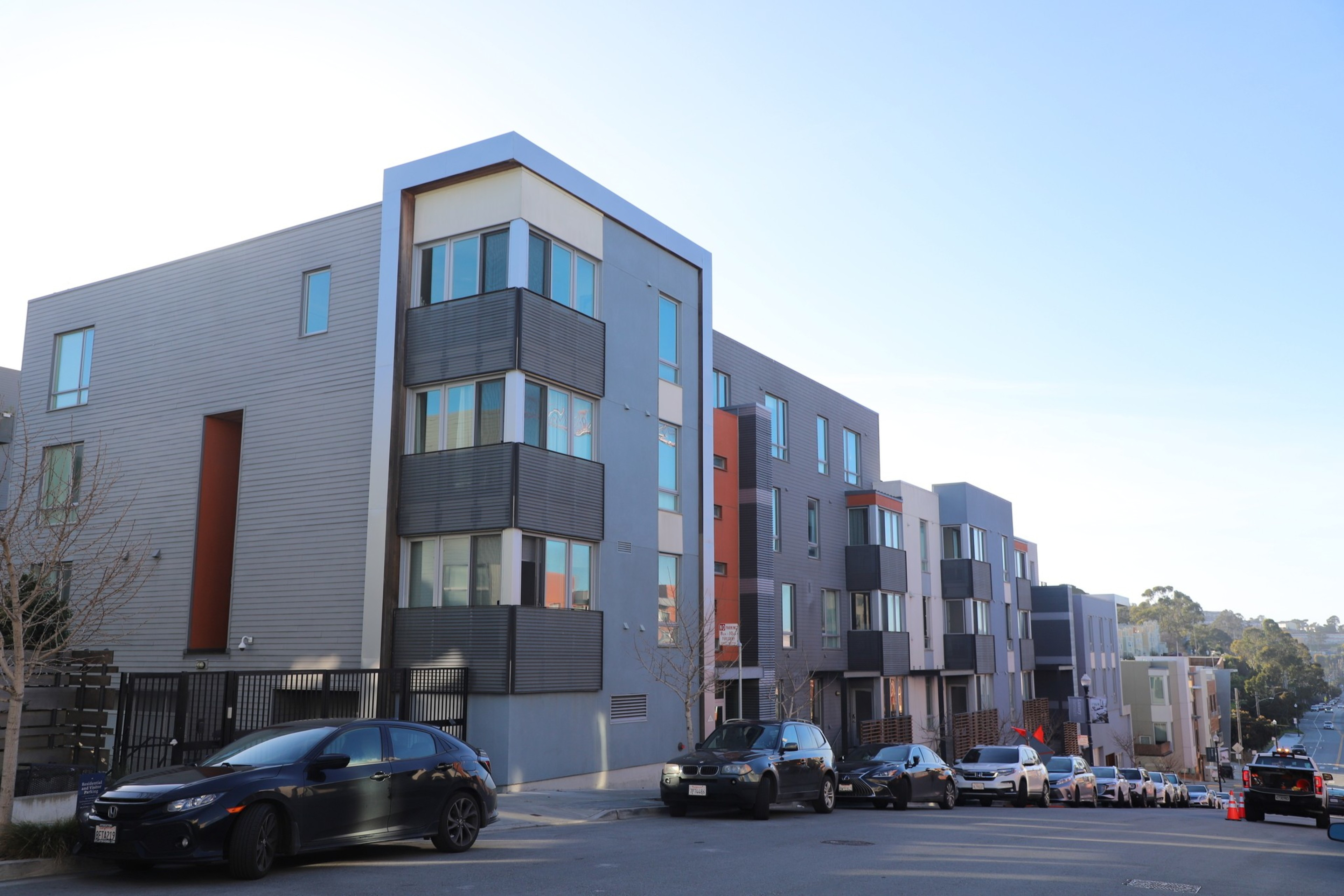 A condo building's facade is seen in a photo.