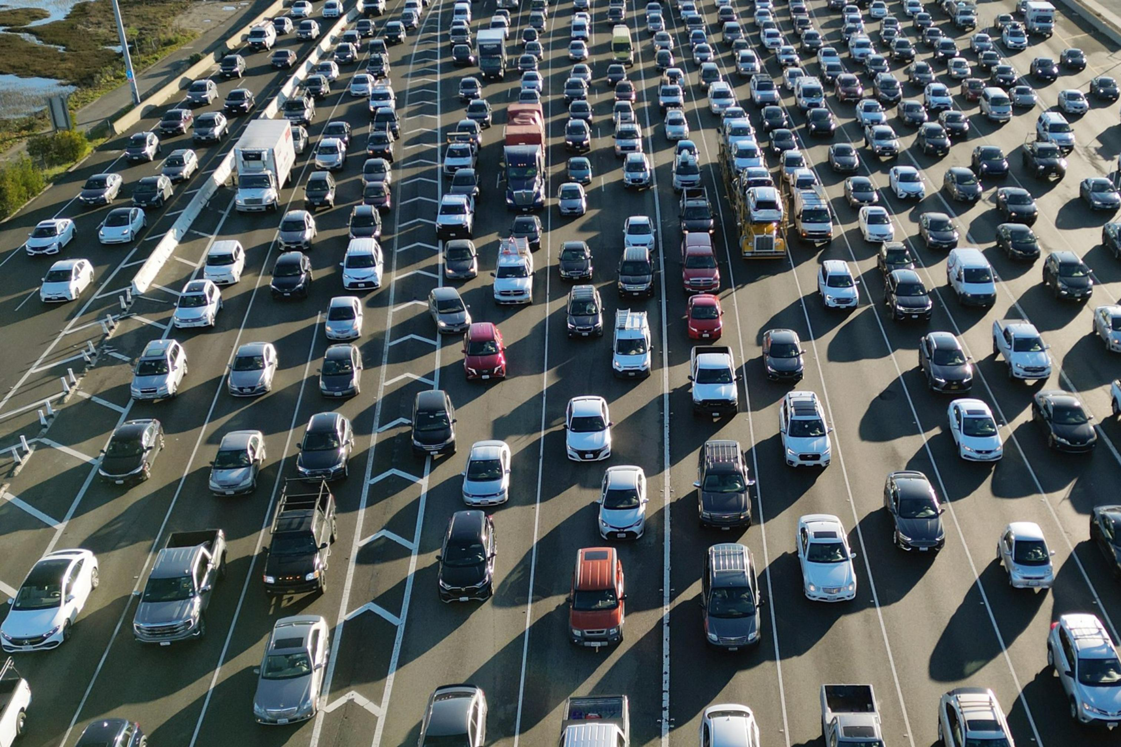 Cars sit in traffic.