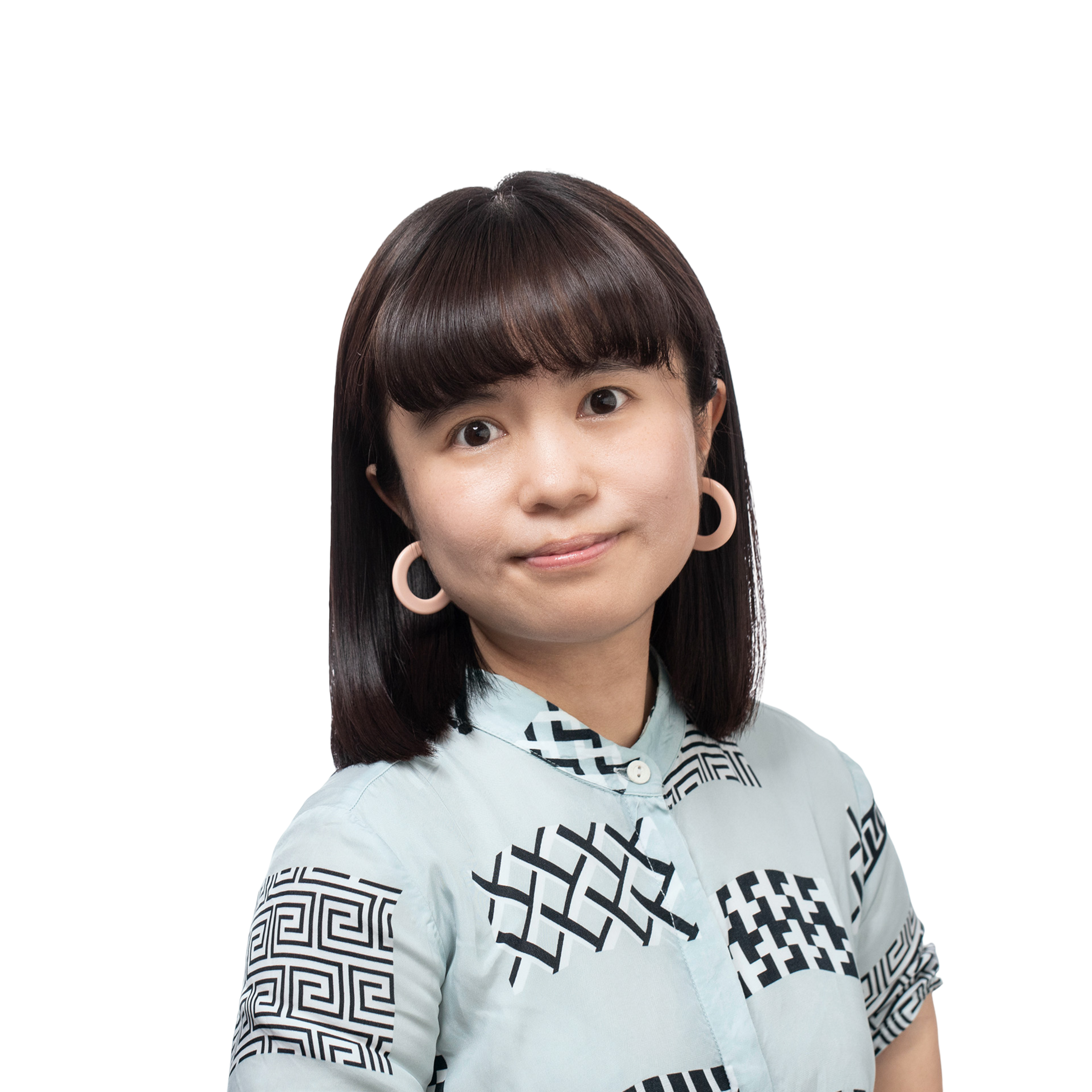 A woman with straight, dark hair and bangs wears large round earrings ...