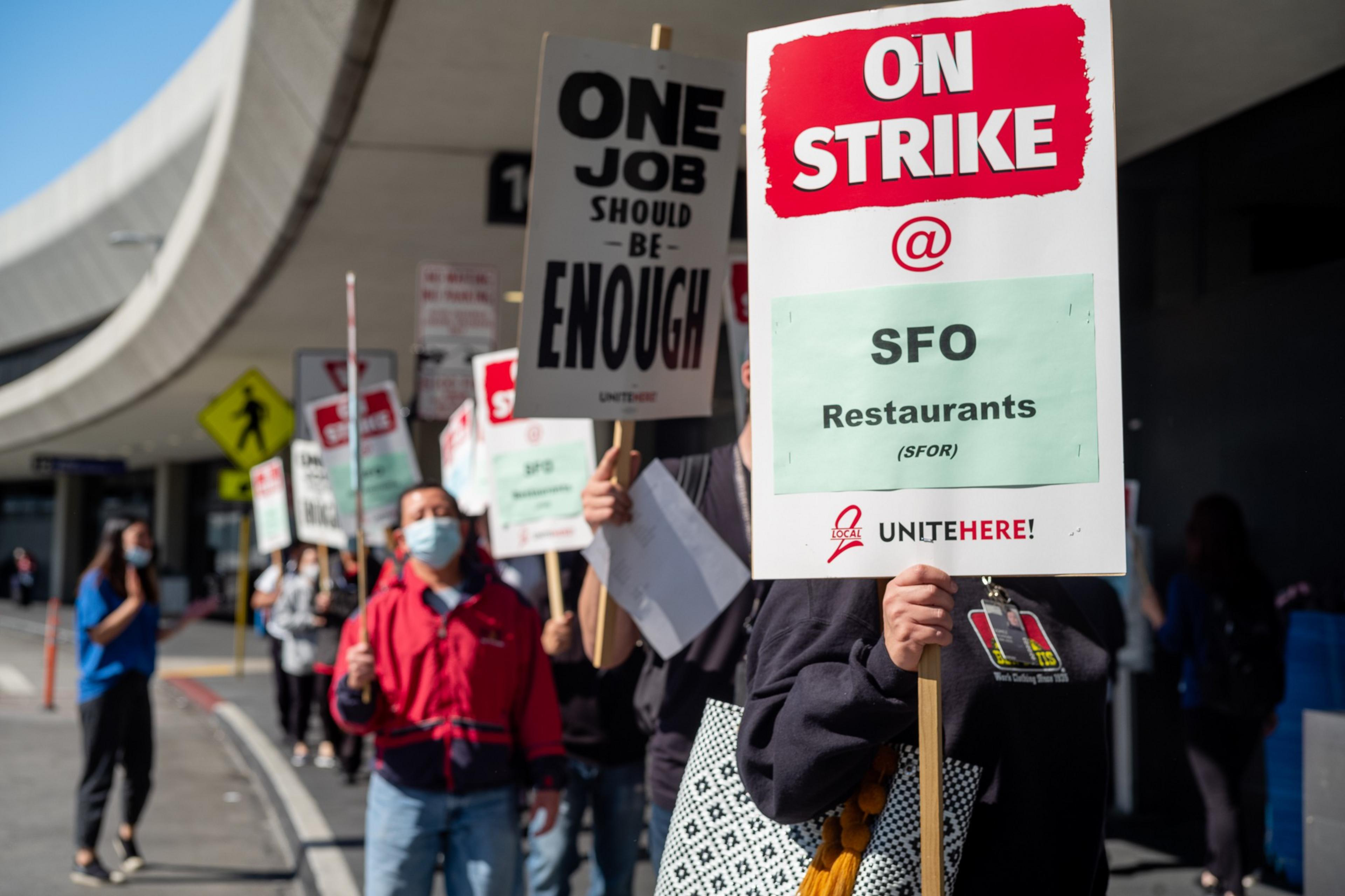 Fast food workers are on strike Monday morning at the San Francisco International Airport (SFO), according to the union representing the workers, in San Francisco, Calif., on Sept. 26, 2022. The workers, represented by the Unite Here Local 2, started strik