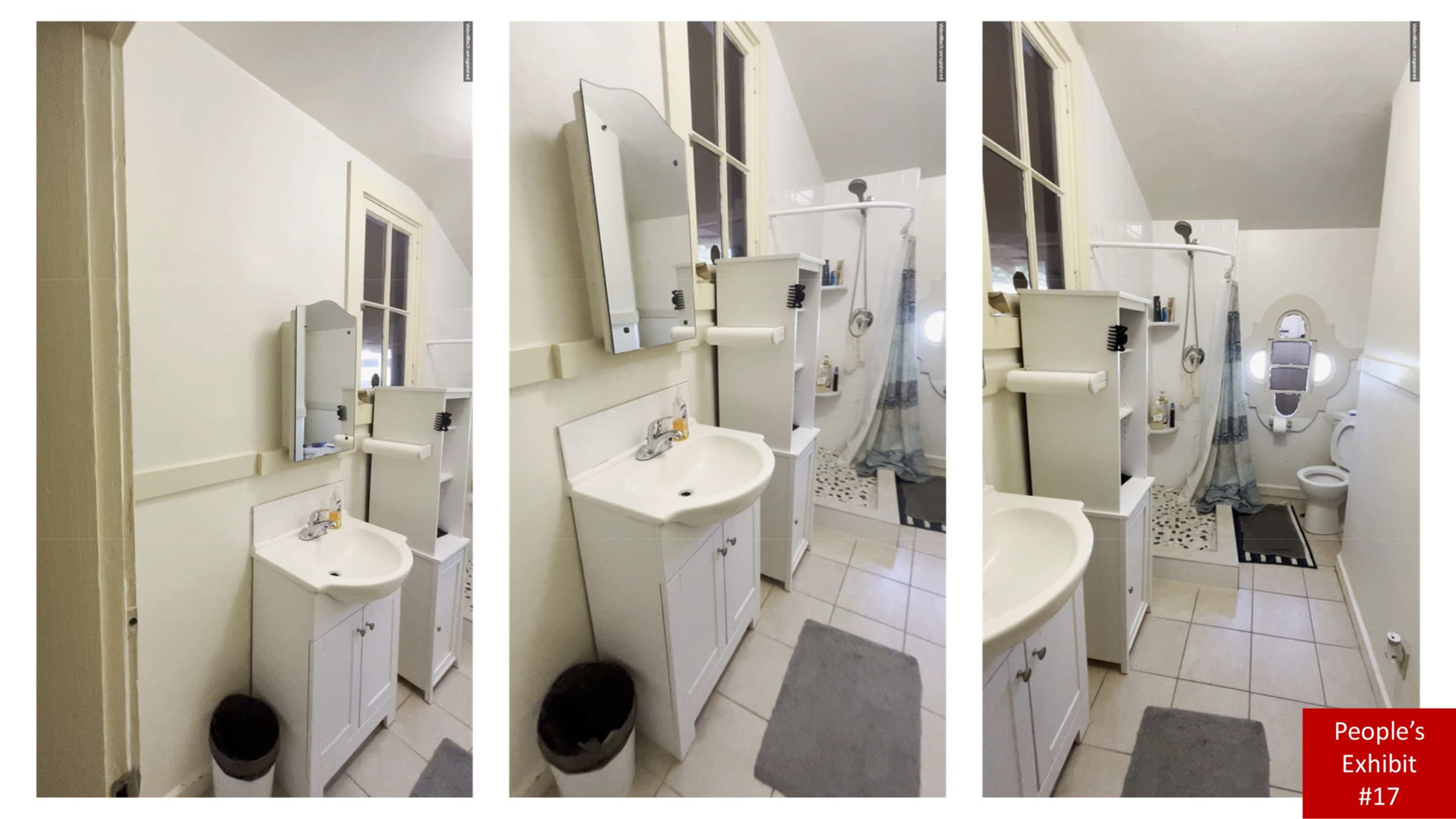 The image shows a small bathroom with a white sink cabinet, a wall mirror, a shower with a curtain, a toilet, and a decorative window.