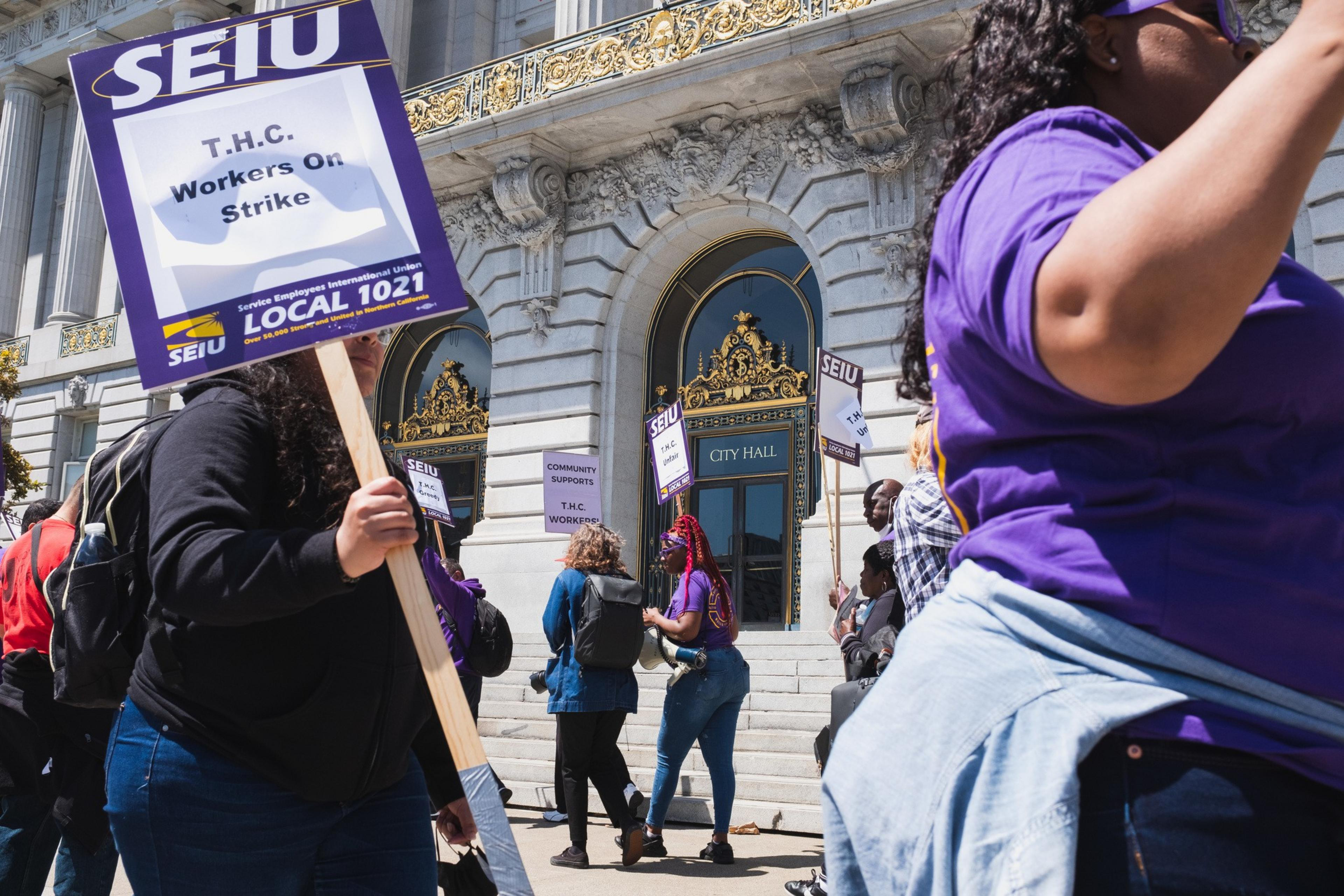 SEIU workers rally at City Hall.