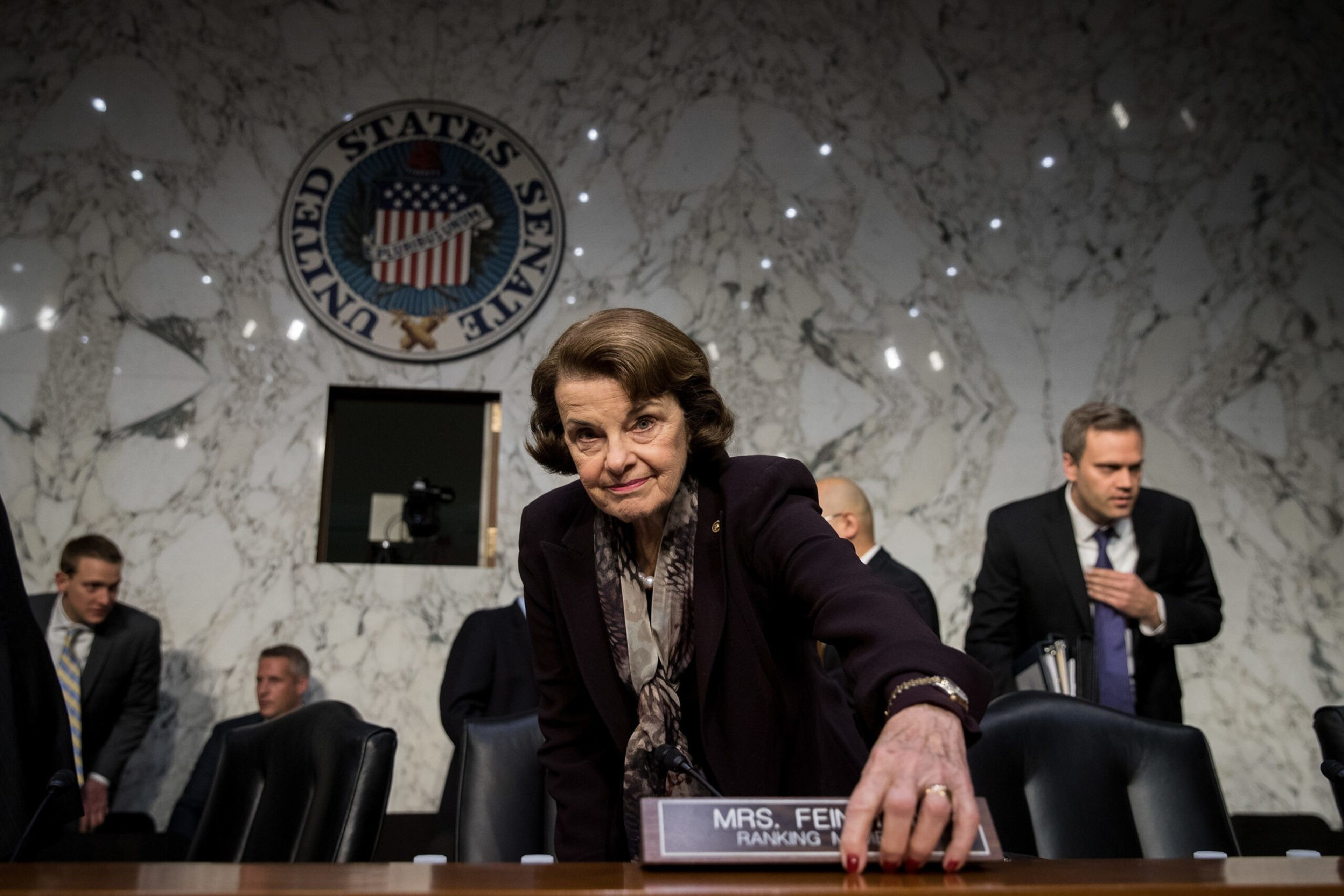 Sen. Dianne Feinstein stands up.