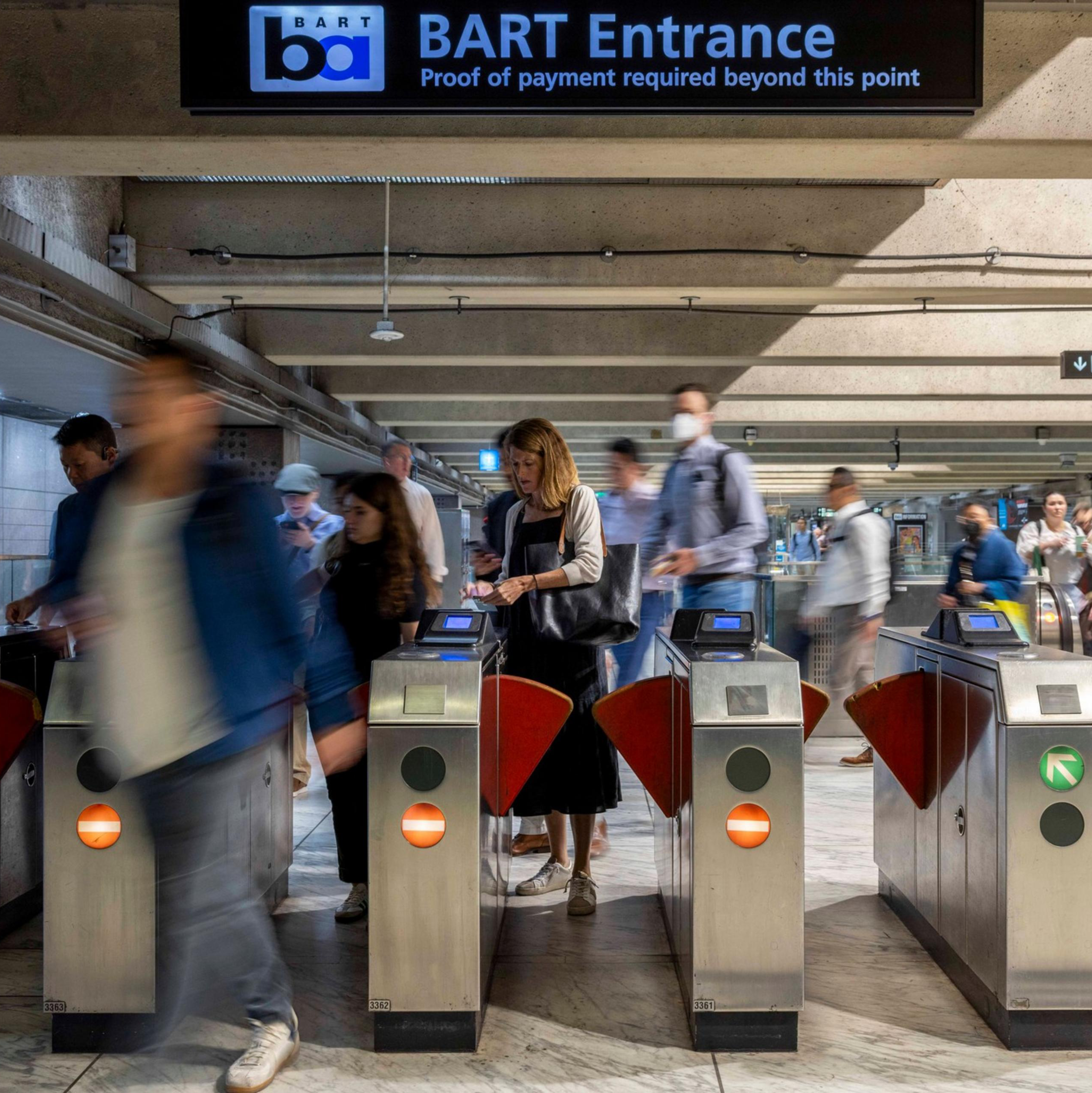 People exit the Embarcadero BART station in San Francisco.