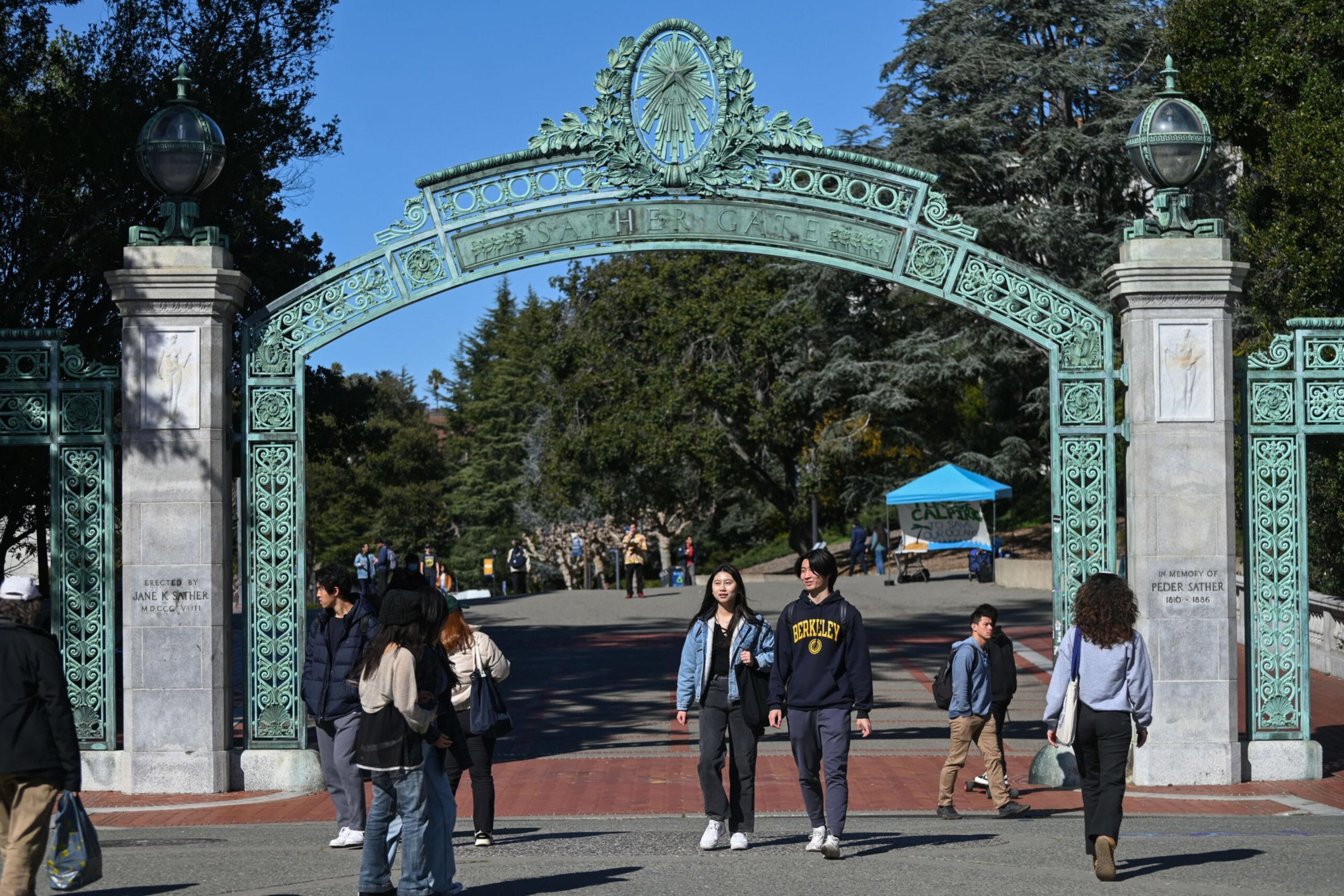 Students walk through Sather Gate at UC Berkeley on Feb. 15, 2023. | Samantha Laurey for The Standard
