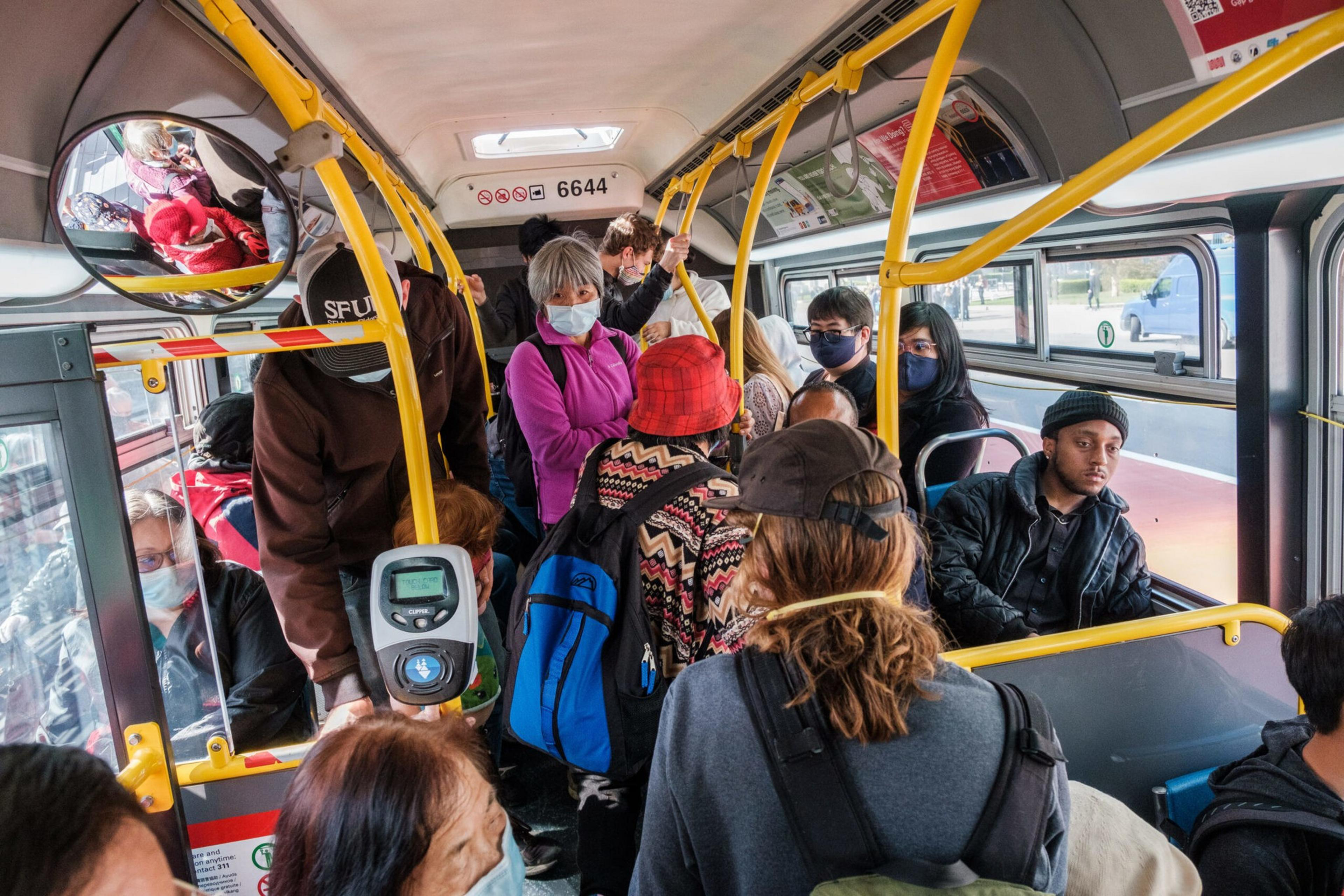 Passengers are seen riding one of the first buses to travel along the new Bus Rapid Transit corridor on Van Ness Avenue in San Francisco on Friday, April 1, 2022. | Nick Otto