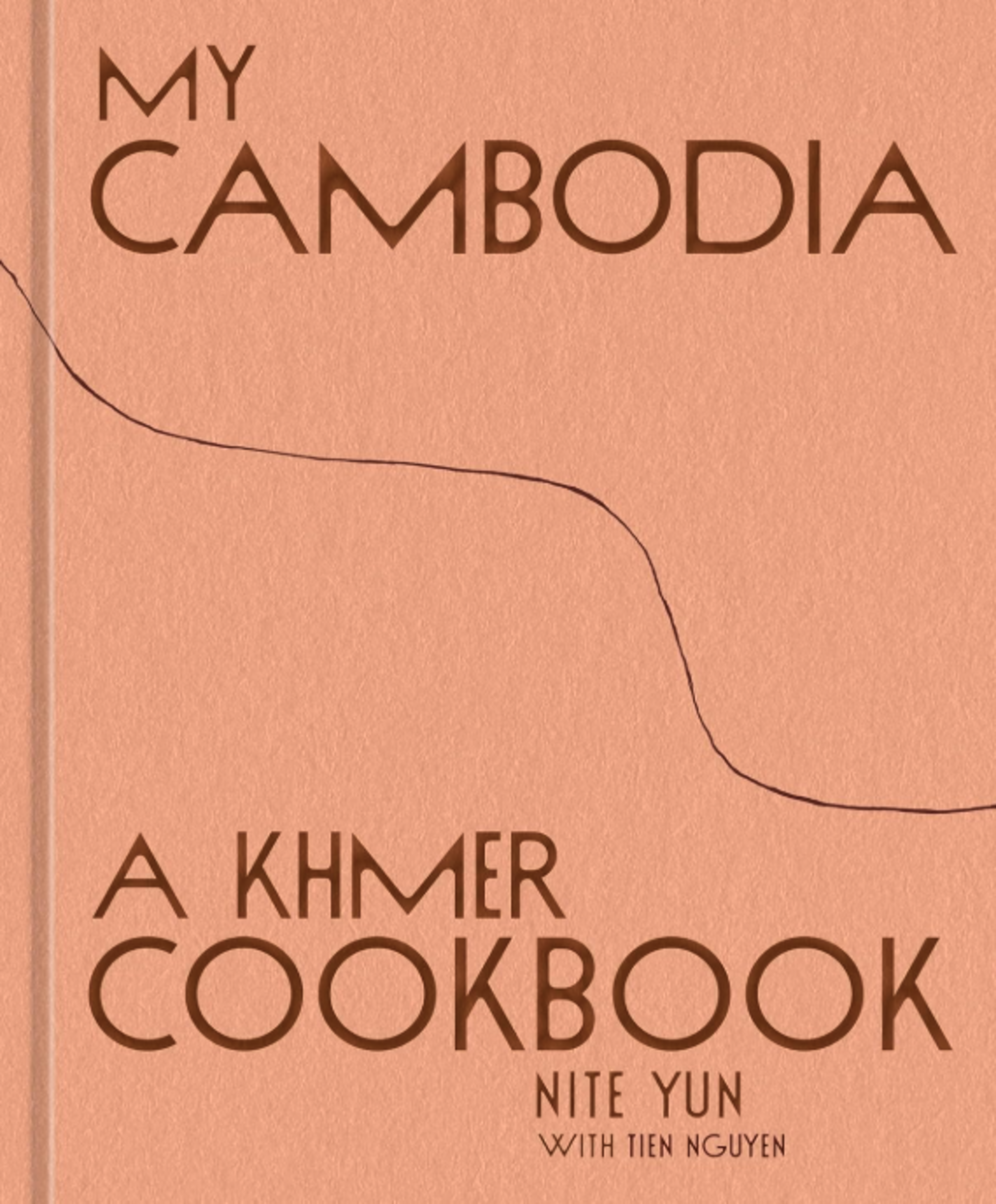 My Cambodia: A Khmer Cookbook by Nite Yun with Tien Nguyen, displayed on a textured, peach-colored background with a thin, dark curving line.
