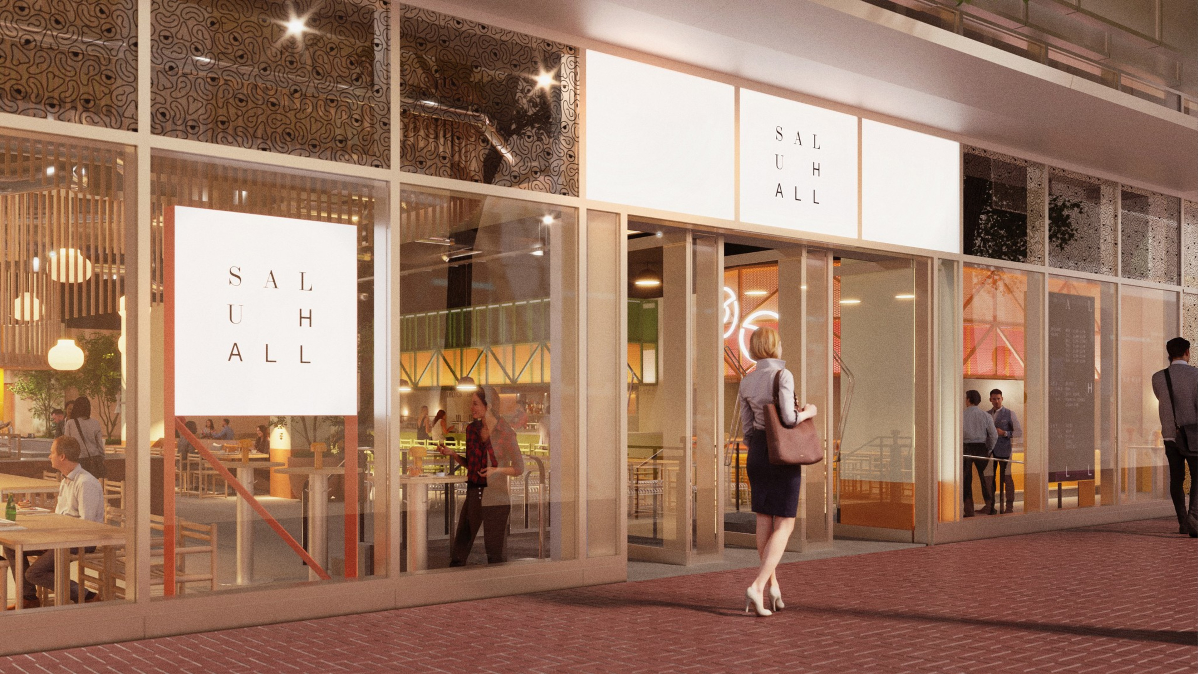 An illuminated eatery at twilight with patrons inside, and a woman approaching its modern, glass facade.
