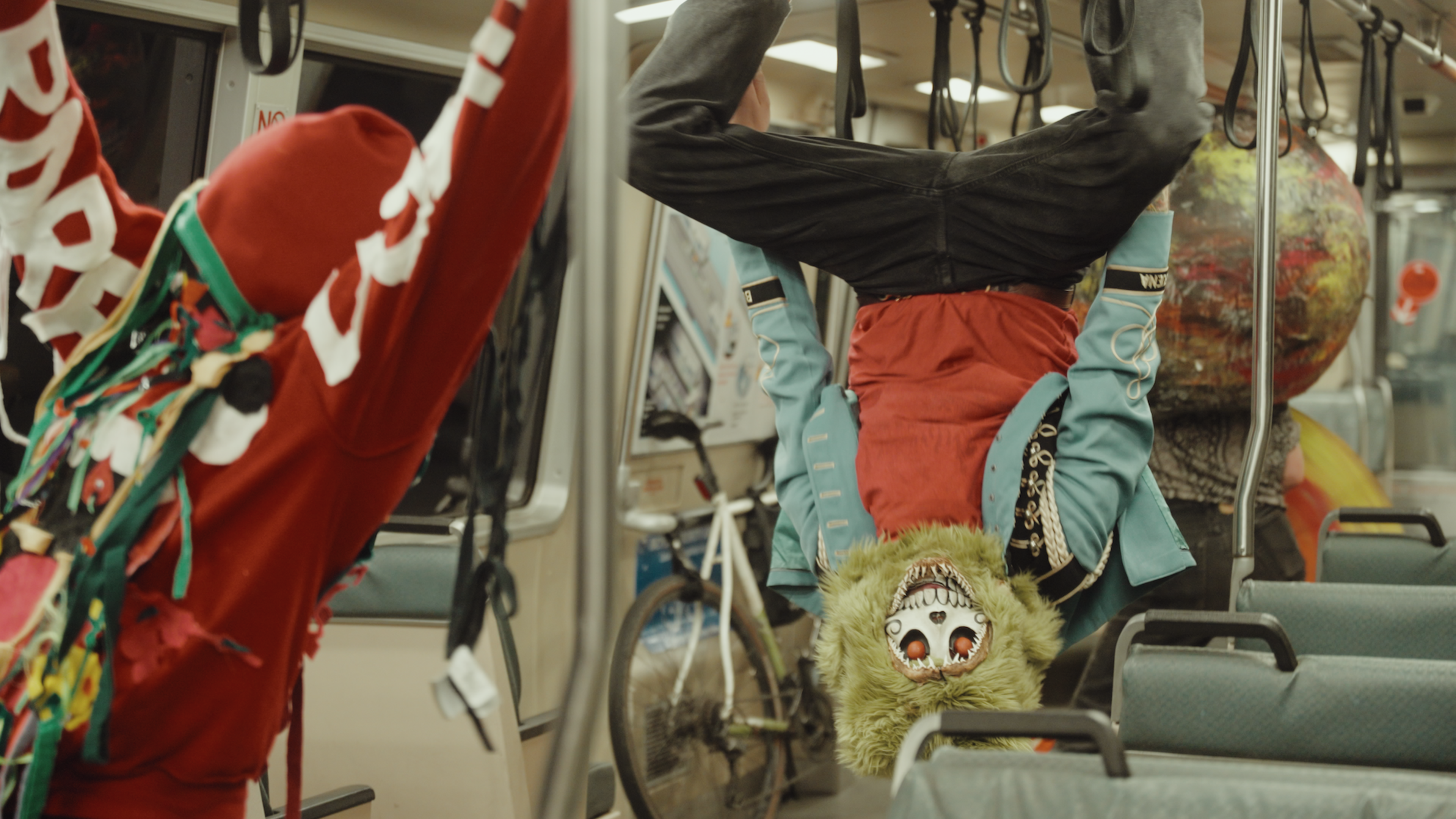 Dancers in the video for Business Casual's &quot;Last BART&quot; song hang from handrails aboard a BART train.