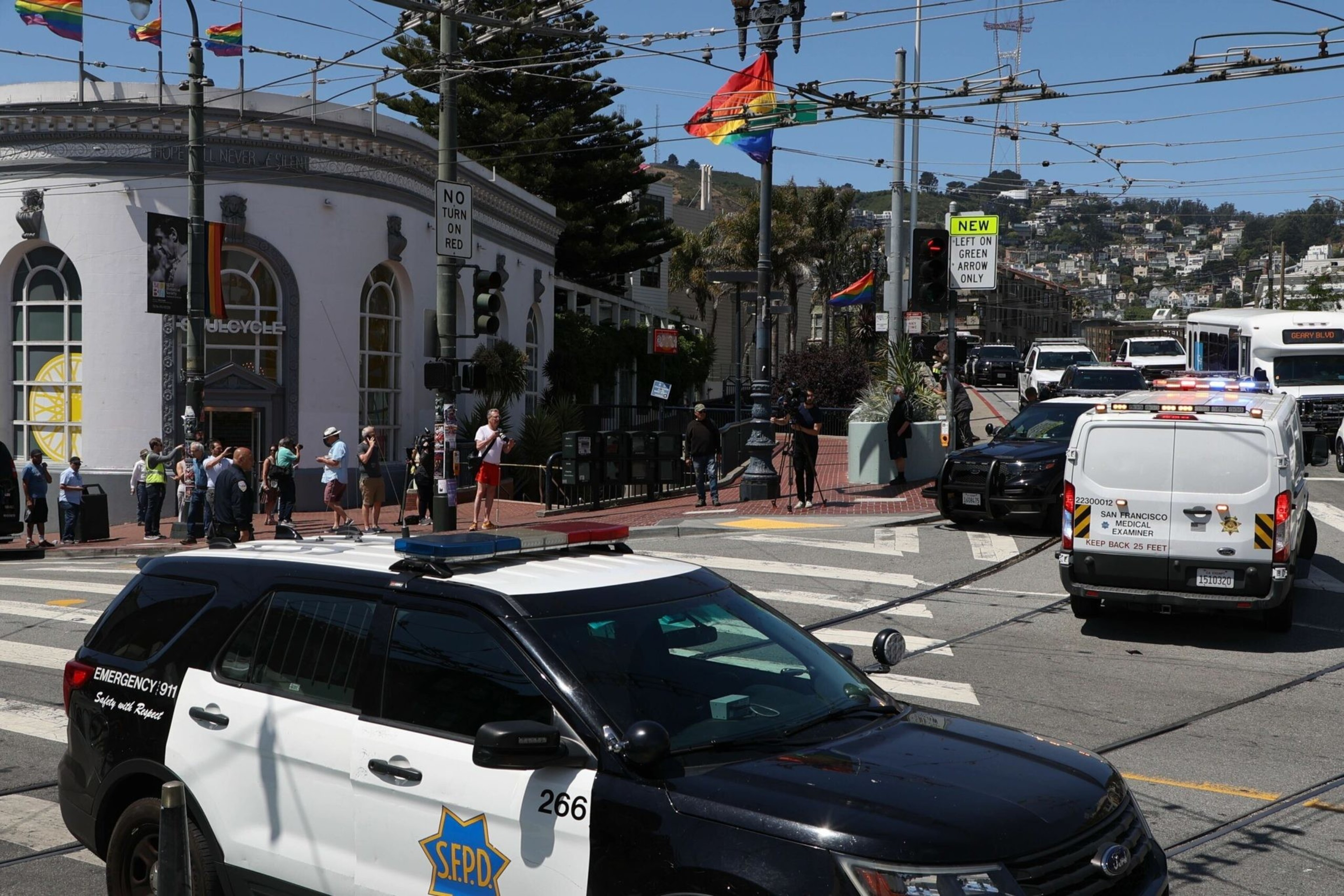 San Francisco Police Officers talk outside the Castro Muni station at Harvey Milk Plaza on Wednesday, June 22, 2022. Following a shooting on a Muni train, SFPD has confirmed that one victim has died and the second sustained non-life threatening injuries. | Camille Cohen/The Standard