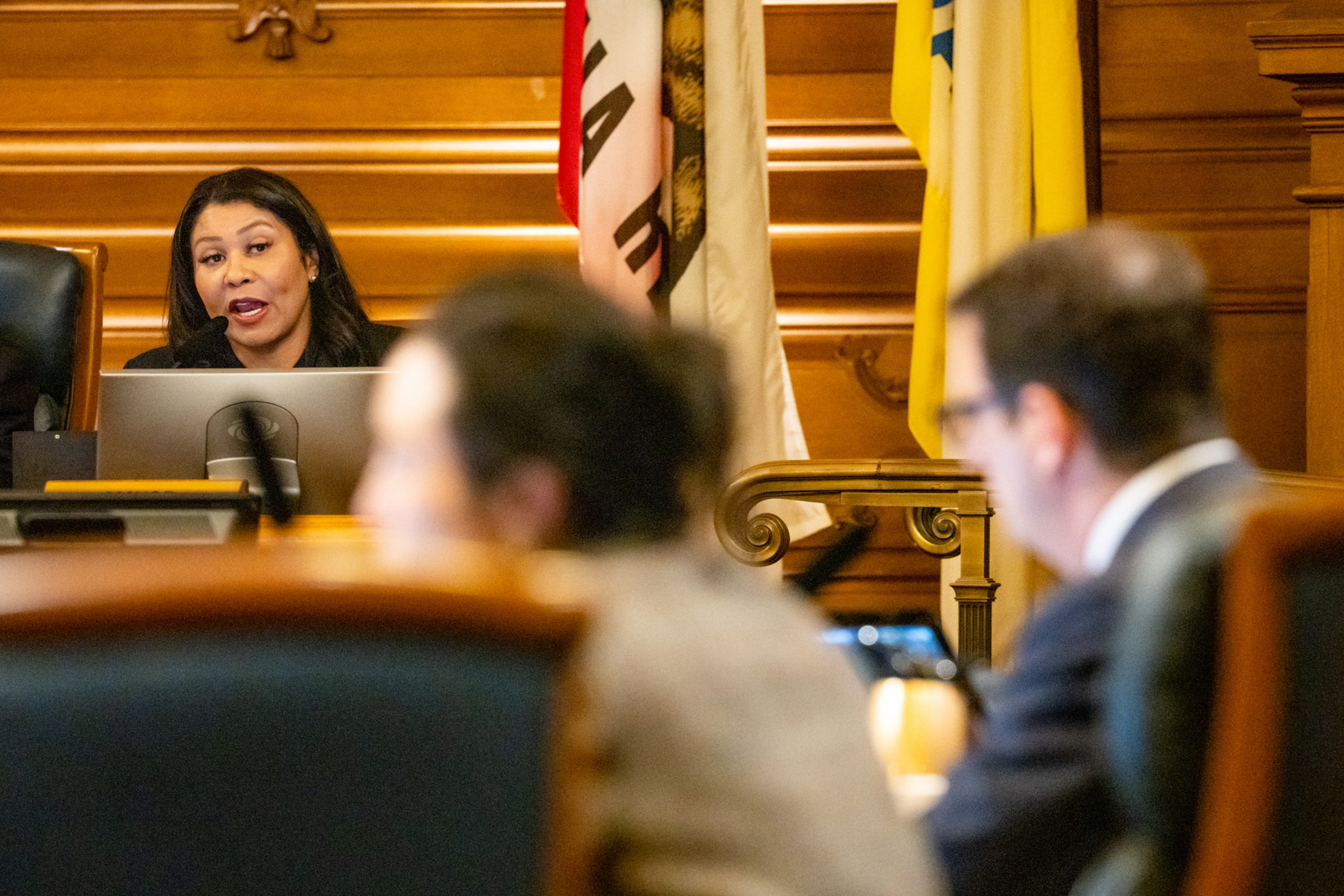 Mayor London Breed talks to Supervisor Dean Preston.